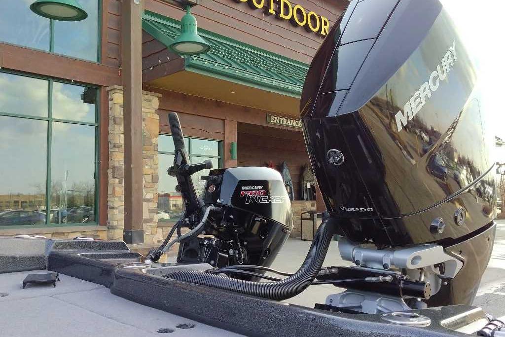 2024 Nitro ZV21 Pro boat with Mercury Verado engine outside a store.