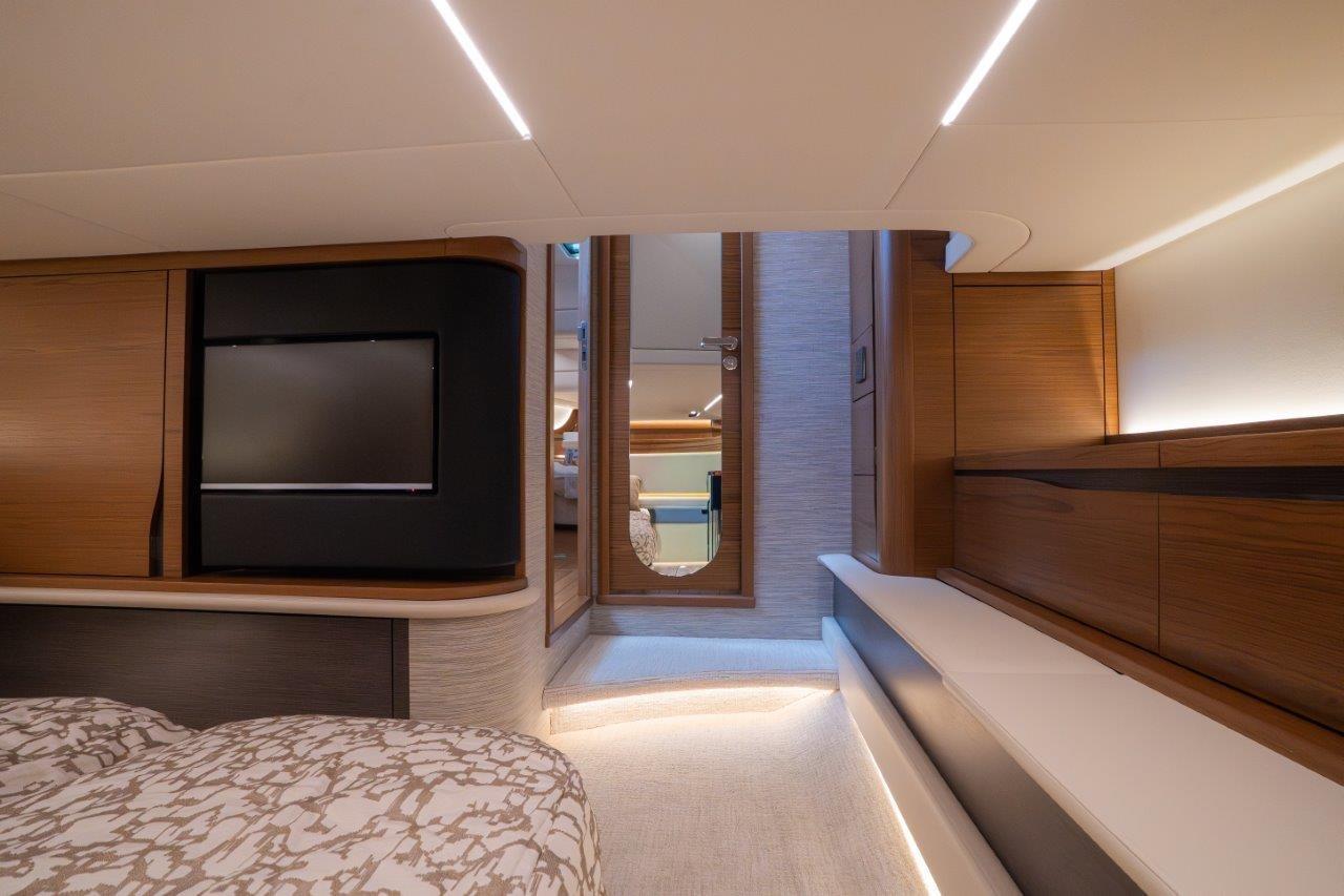 Luxurious interior of 2026 Tiara Yachts 56 LS, featuring modern design and ambient lighting.