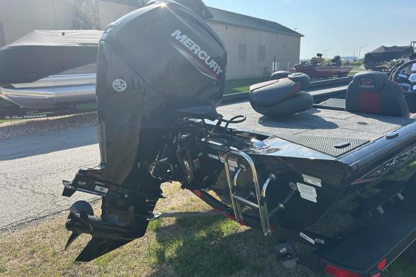 2025 Ranger RT188C boat with Mercury outboard motor, parked outdoors.
