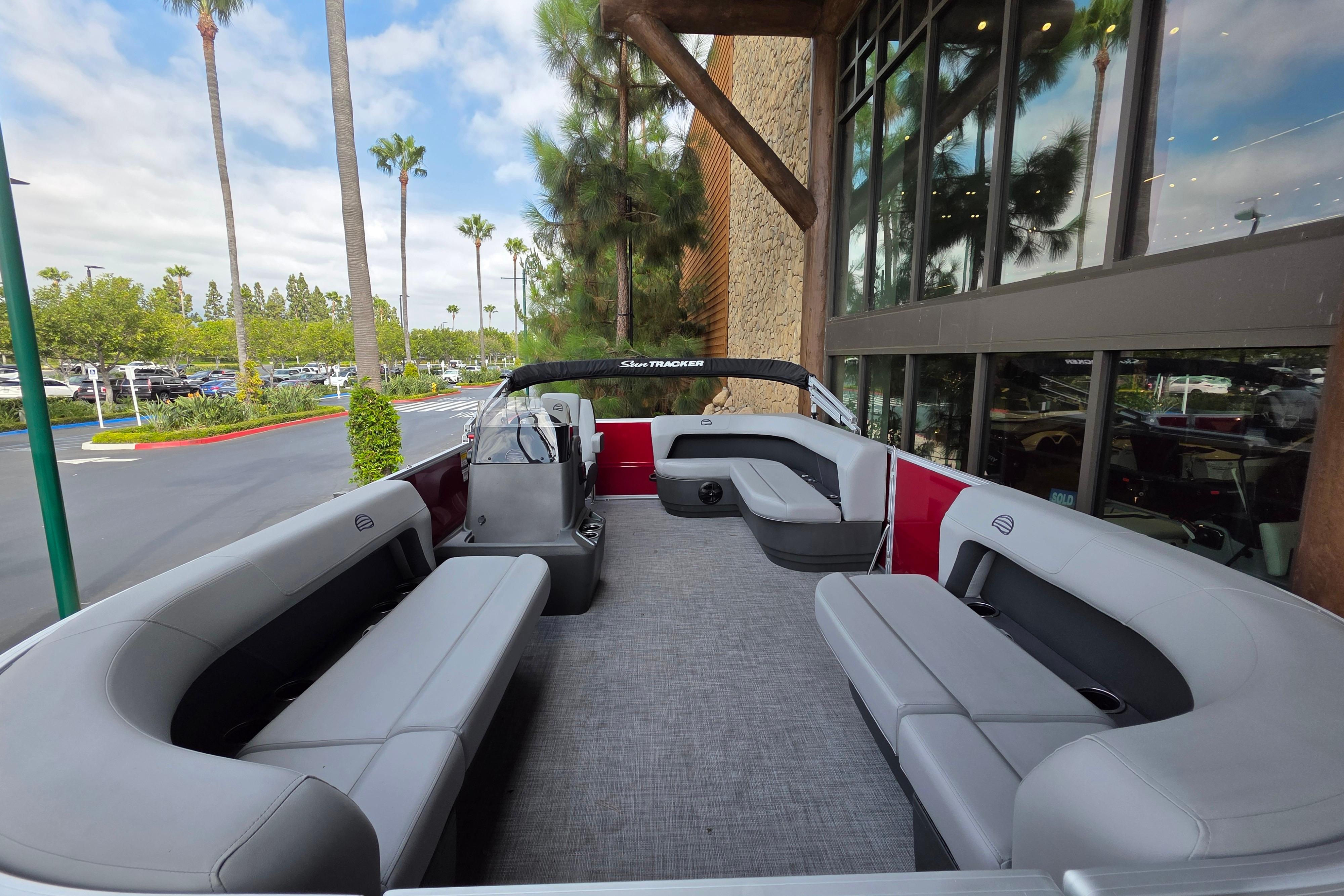 2026 Sun Tracker Party Barge 16 DLX pontoon boat with spacious seating and modern design.