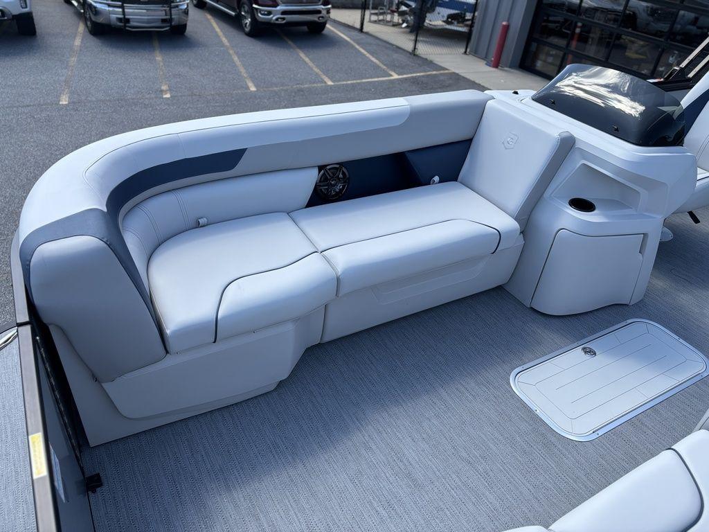 2026 Godfrey SWEETWATER 2286 SFL boat interior with sleek seating and modern design.