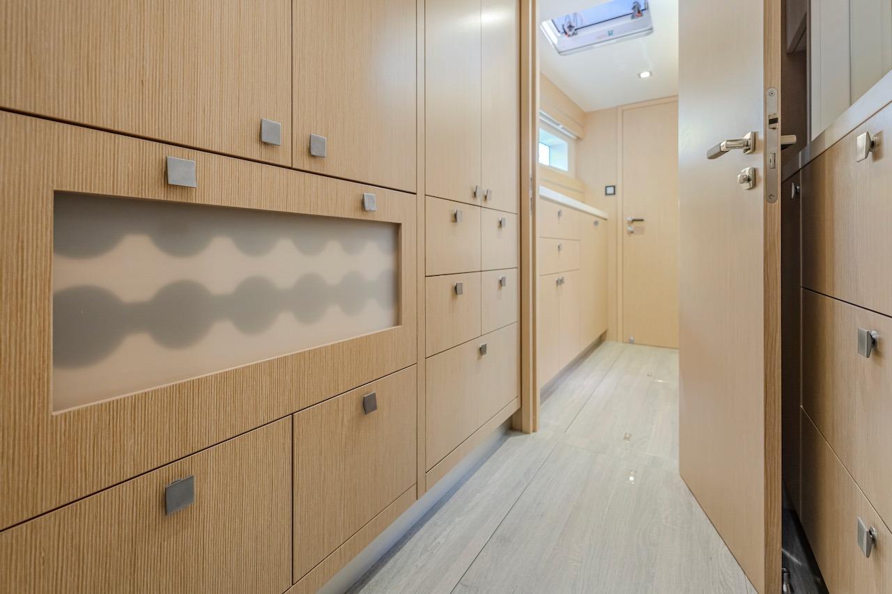 Interior of Privilege Signature 510 yacht, modern wood cabinetry, 2025 model.