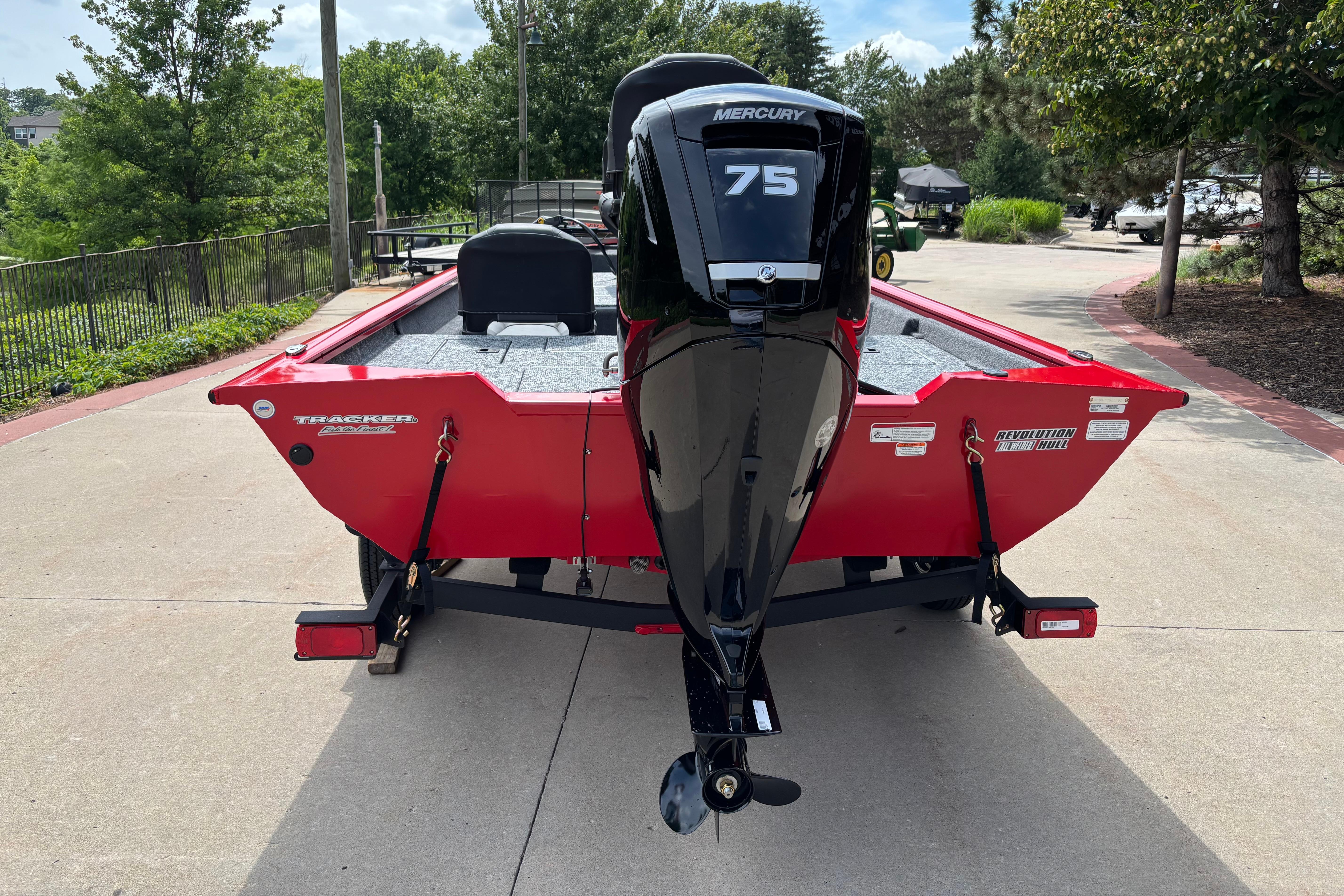 2026 Tracker Pro Team 175 Crappie Edition boat with Mercury 75 engine, parked outdoors.