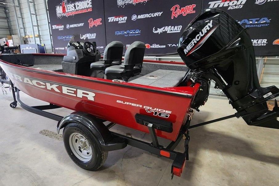 2026 Tracker Super Guide V-16 SC boat with Mercury engine on display.
