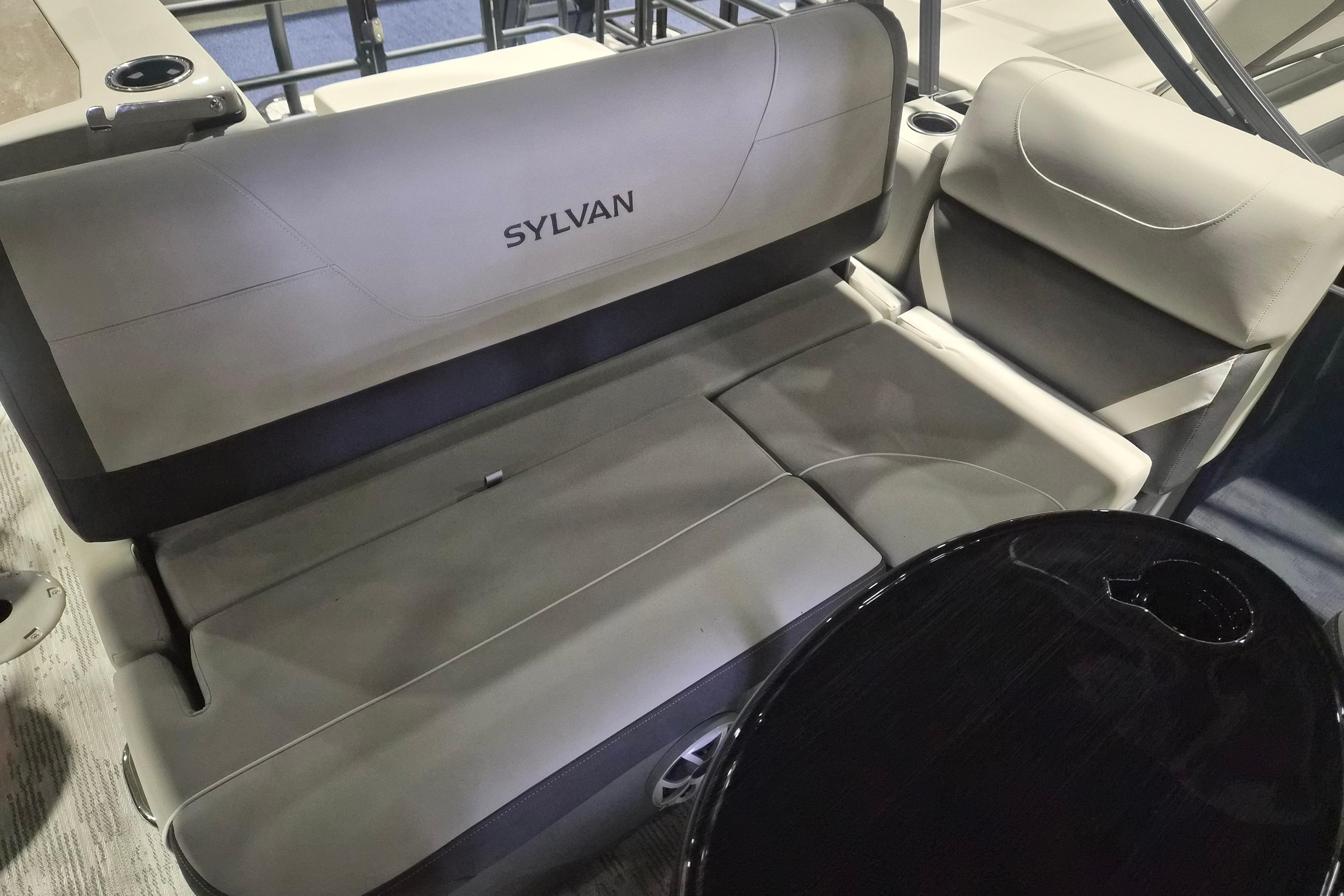 Luxurious seating on 2026 Sylvan R-22 LZ DH boat, featuring sleek design and comfort.