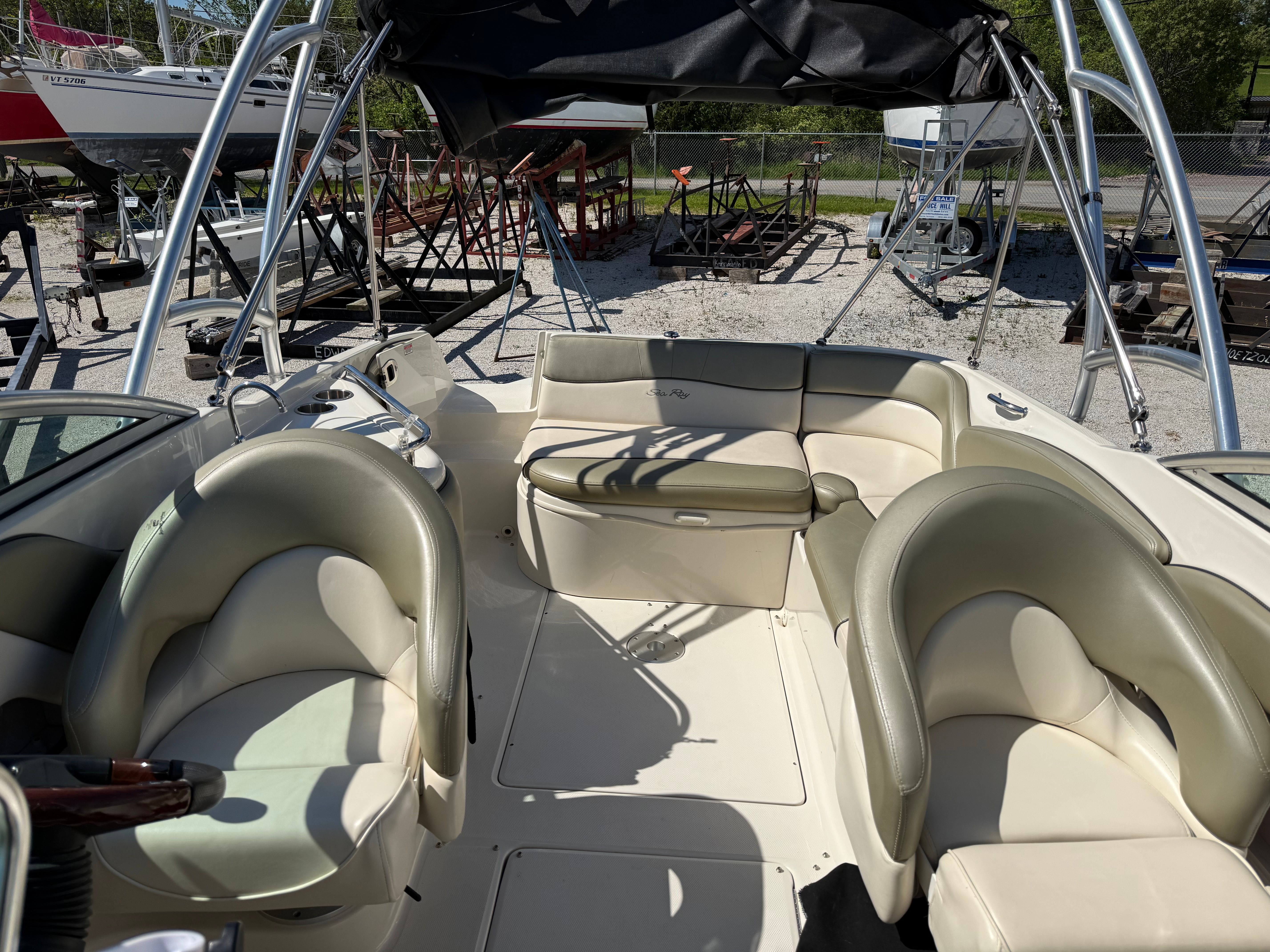 Interior of a 2005 Sea Ray 240 Sundeck boat in dry dock.