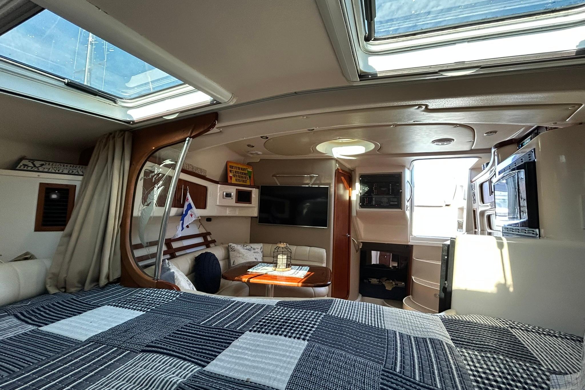 Interior of 2007 Grady-White Express 360 boat with skylights and cozy seating area.