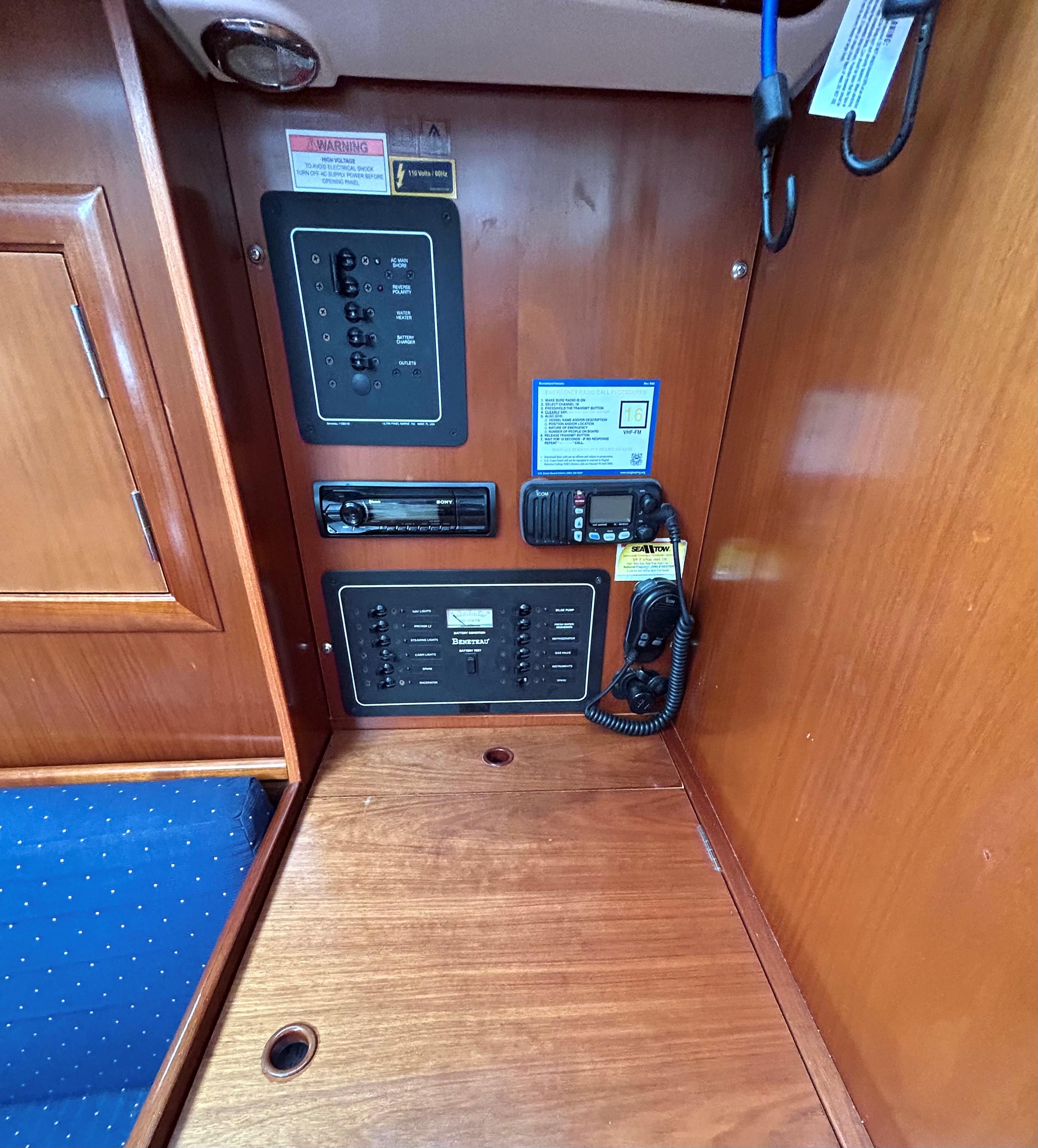 Interior view of 2005 Beneteau 323 yacht with control panel.