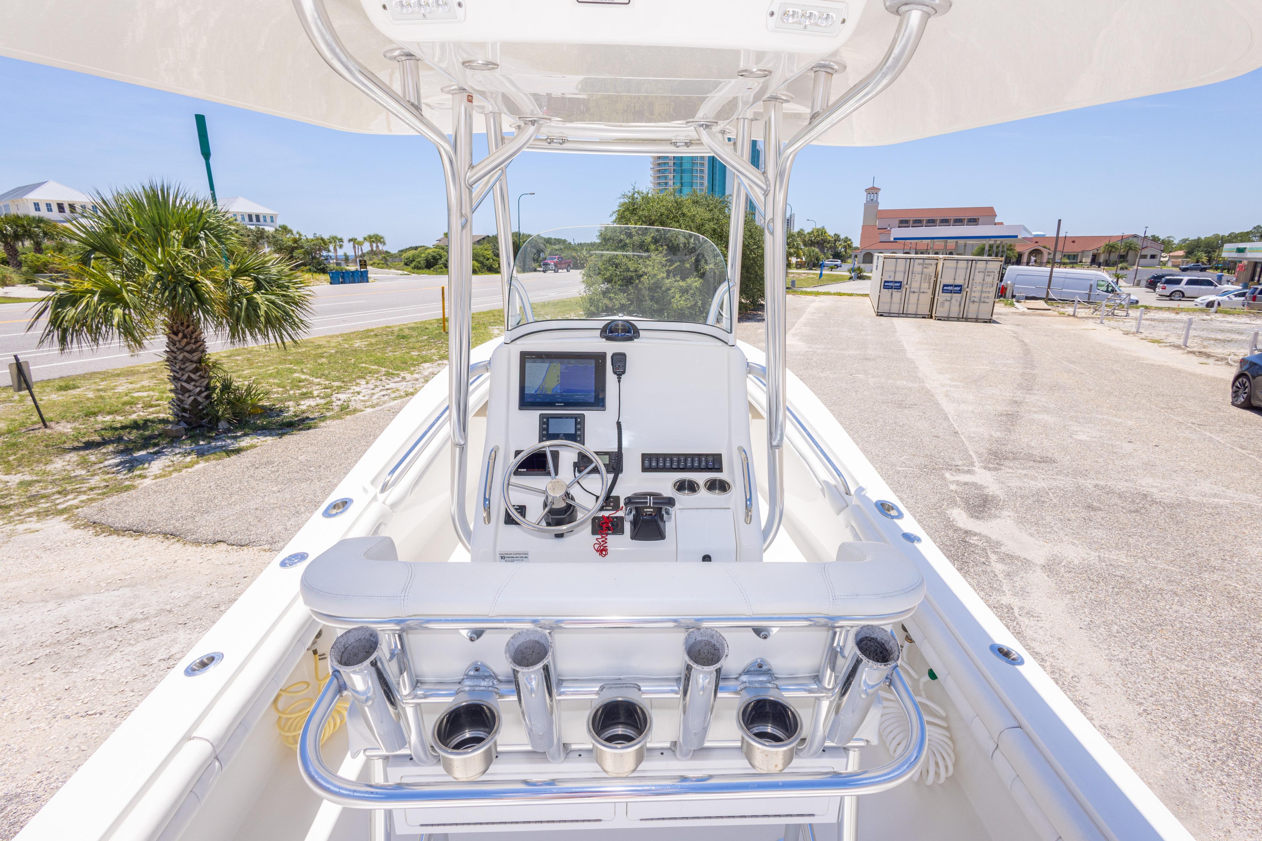 2019 Regulator 23 Center Console boat with modern helm and rod holders.