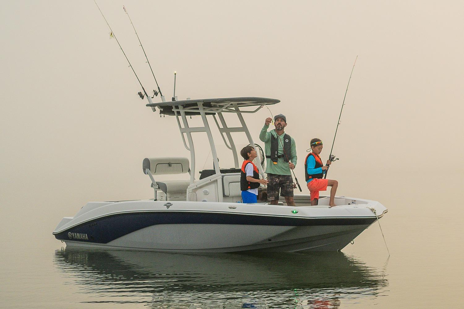 Manufacturer Provided Image: Family fishing on a 2026 Yamaha Boats 195 FSH Sport in calm waters.