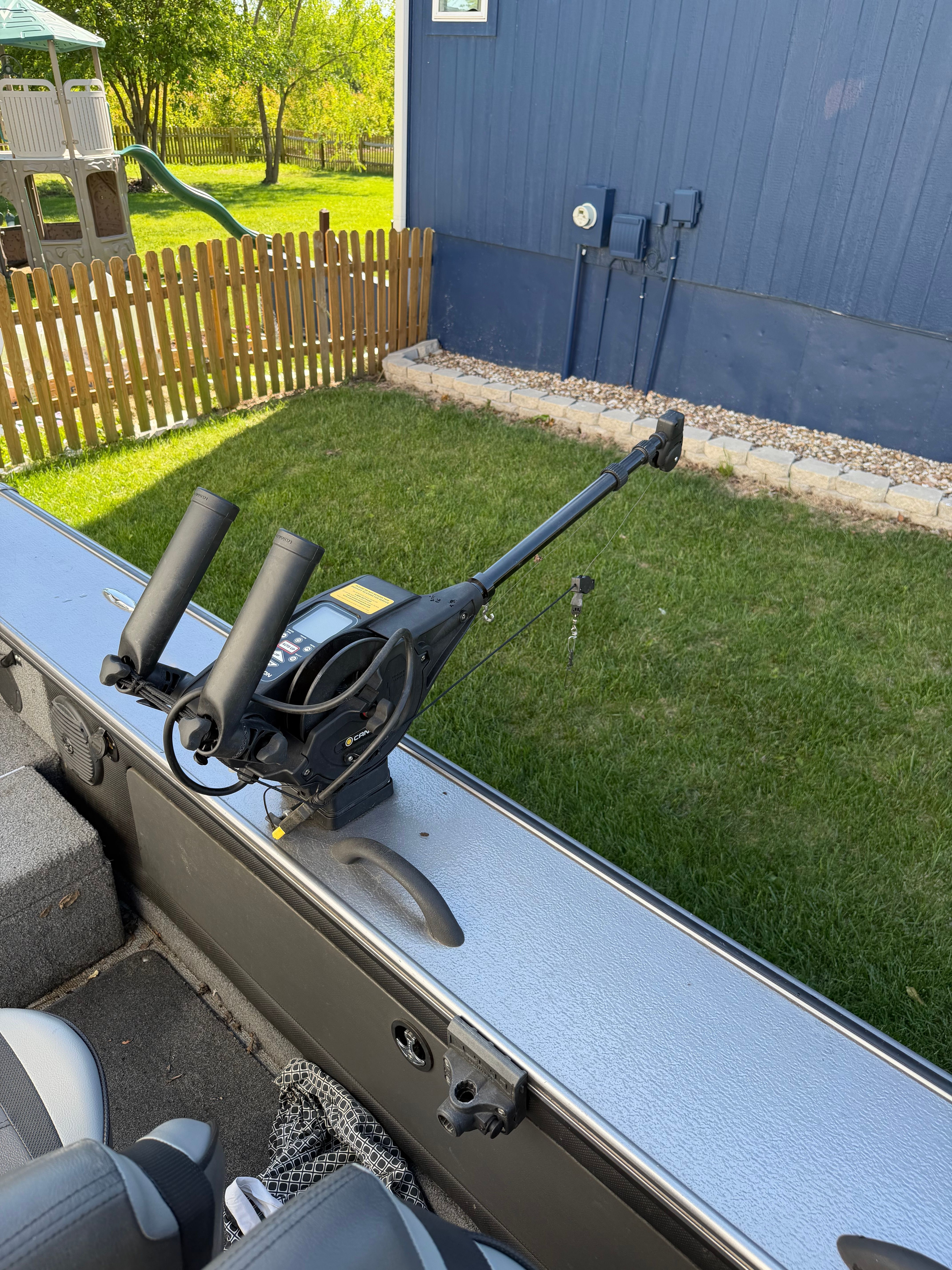 Lund Pro V 1975 boat with fishing rod holder, 2017 model.