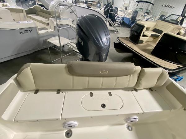2024 Key West 219 FS boat with Yamaha outboard motor in showroom.