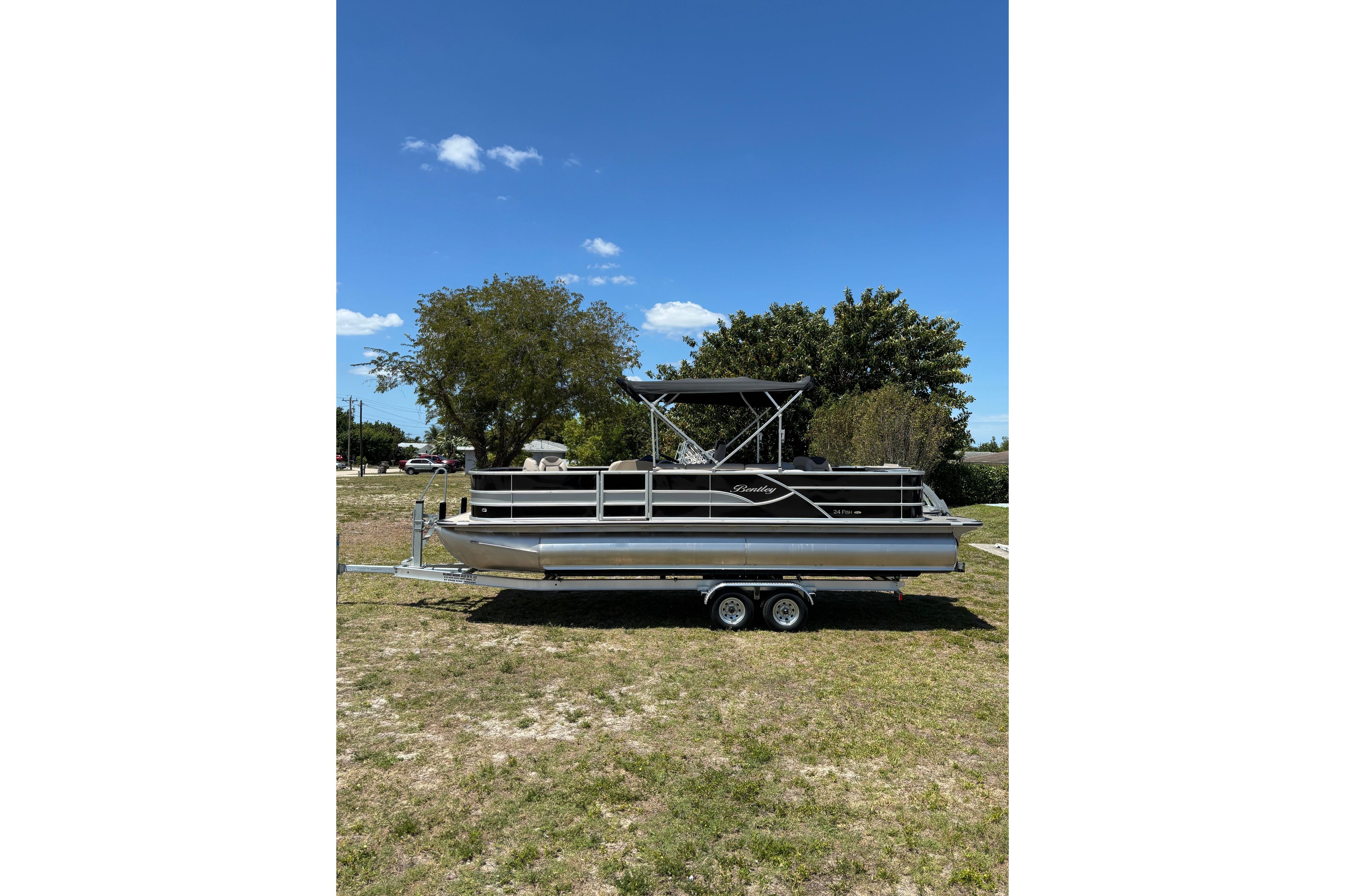 2026 Bentley Pontoons Fish 243 4-Point on trailer outdoors.