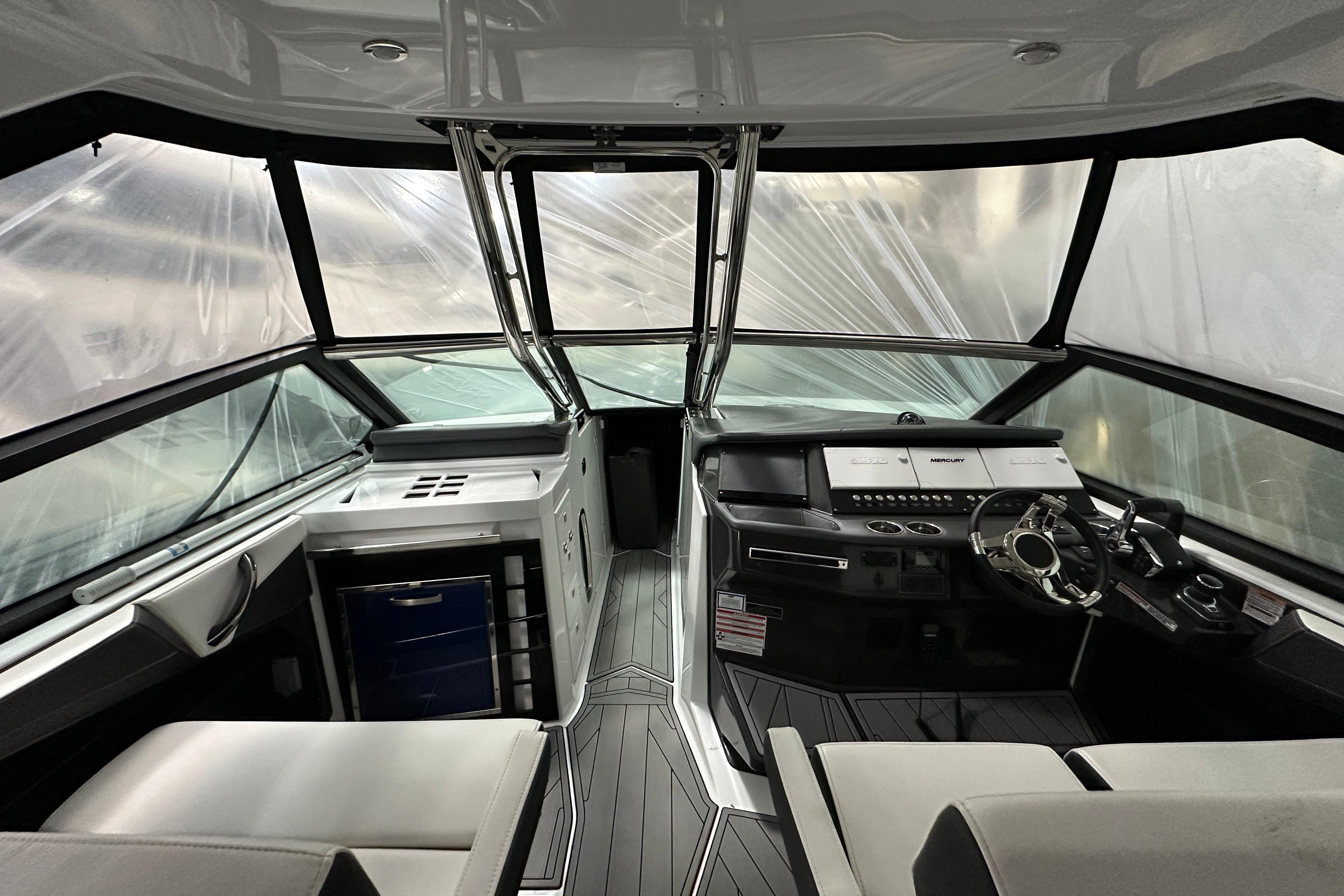Interior view of 2023 Monterey 378SS Super Sport boat cockpit with modern controls and seating.