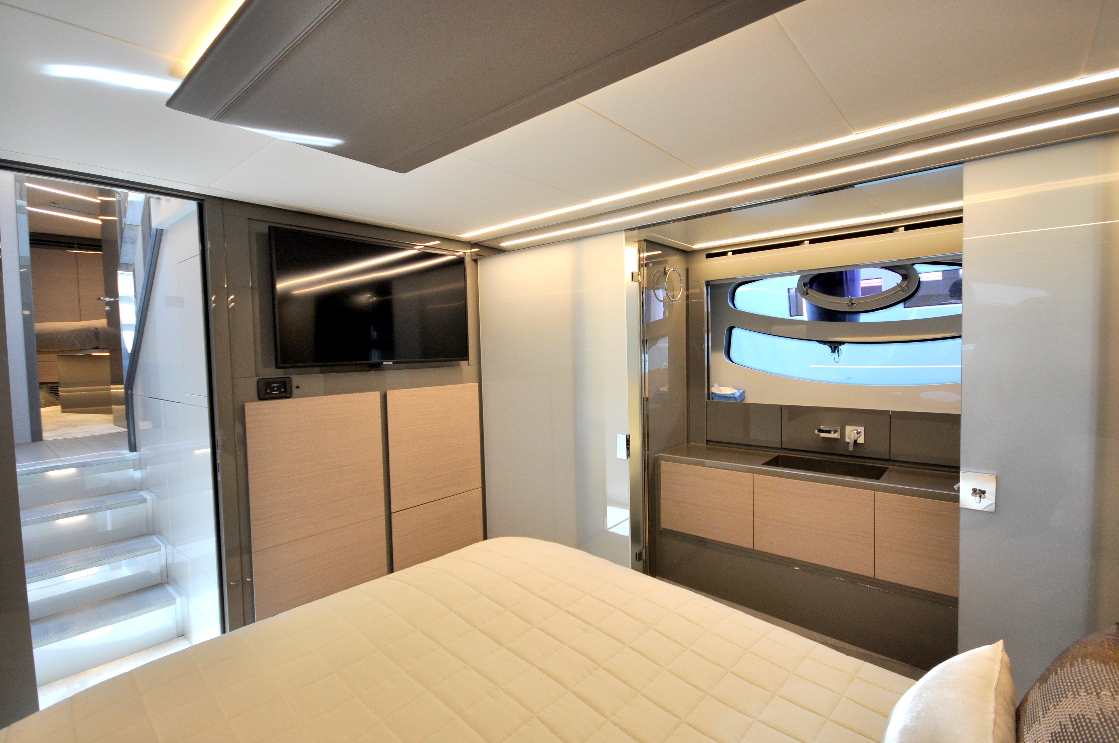 Luxurious interior of a 2020 Pershing 62' yacht featuring modern design and amenities.
