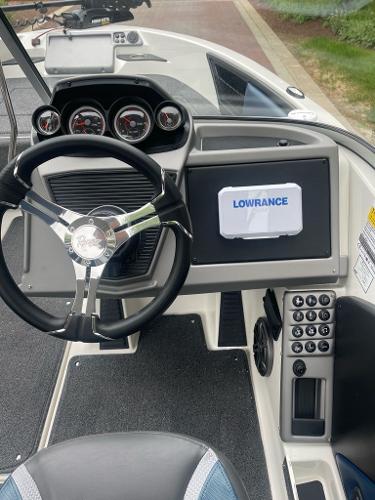 2025 Ranger 1850MS boat dashboard with Lowrance display and modern steering wheel.
