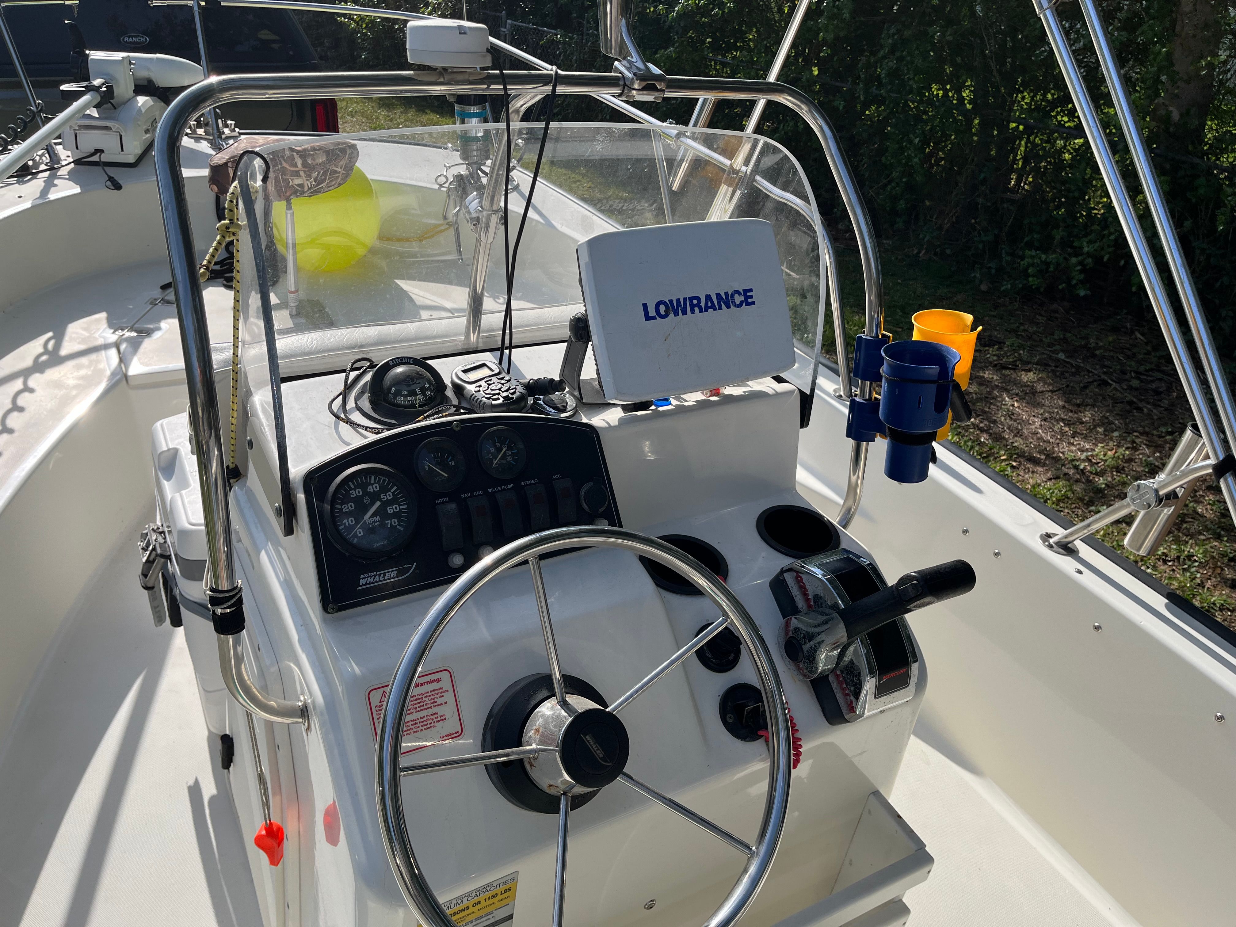 Steering console of a 2005 Boston Whaler 170 Montauk boat.