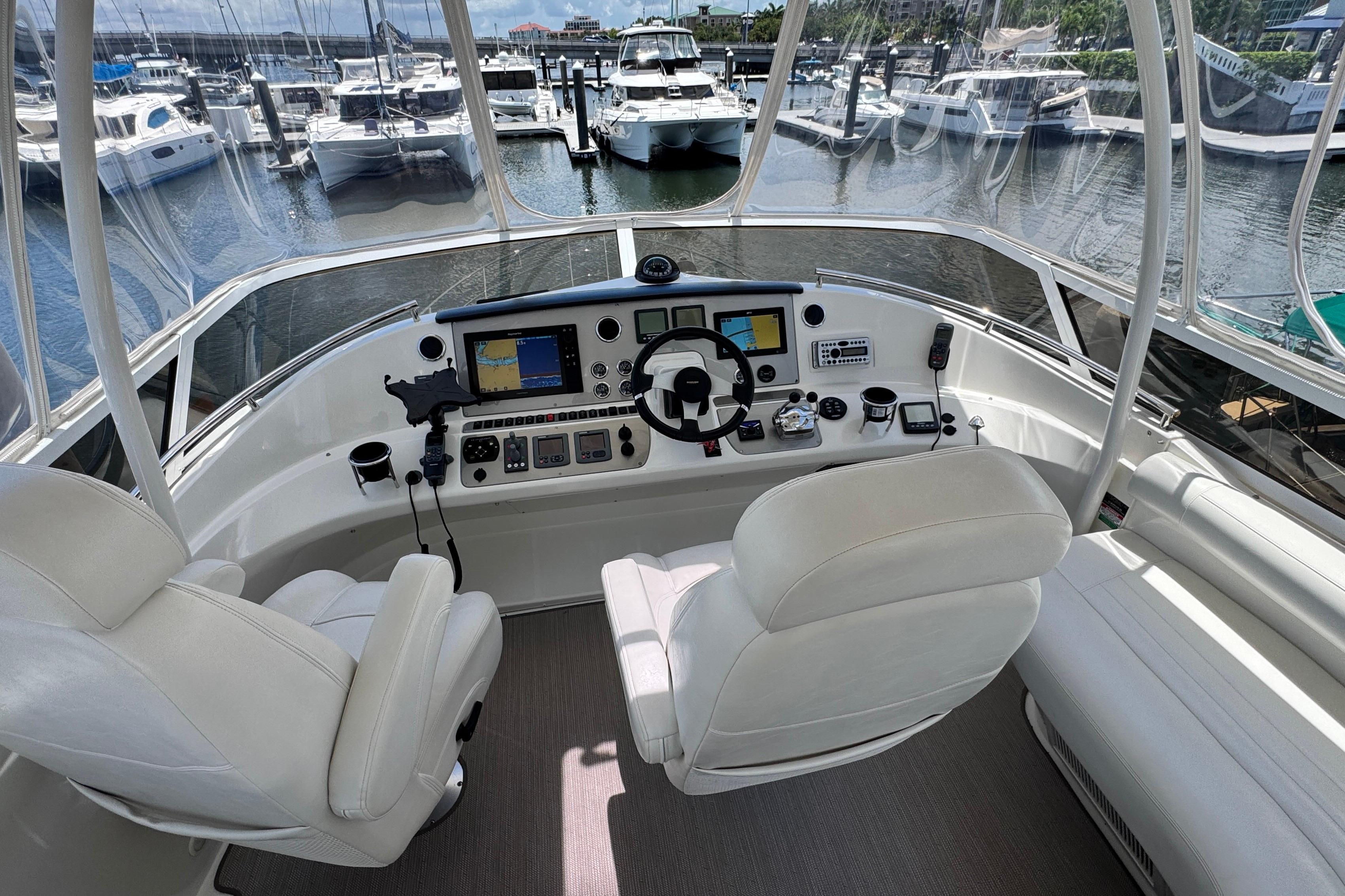 2007 Carver 47 Motor Yacht Cockpit with Dual Seats and Navigation Controls