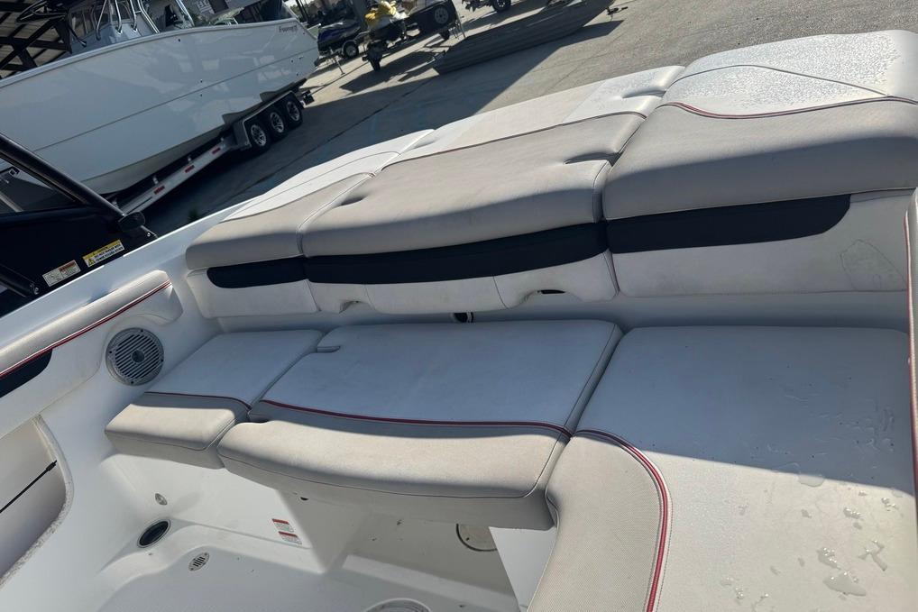 2018 Tahoe 700 TF boat interior with cushioned seating and speaker.