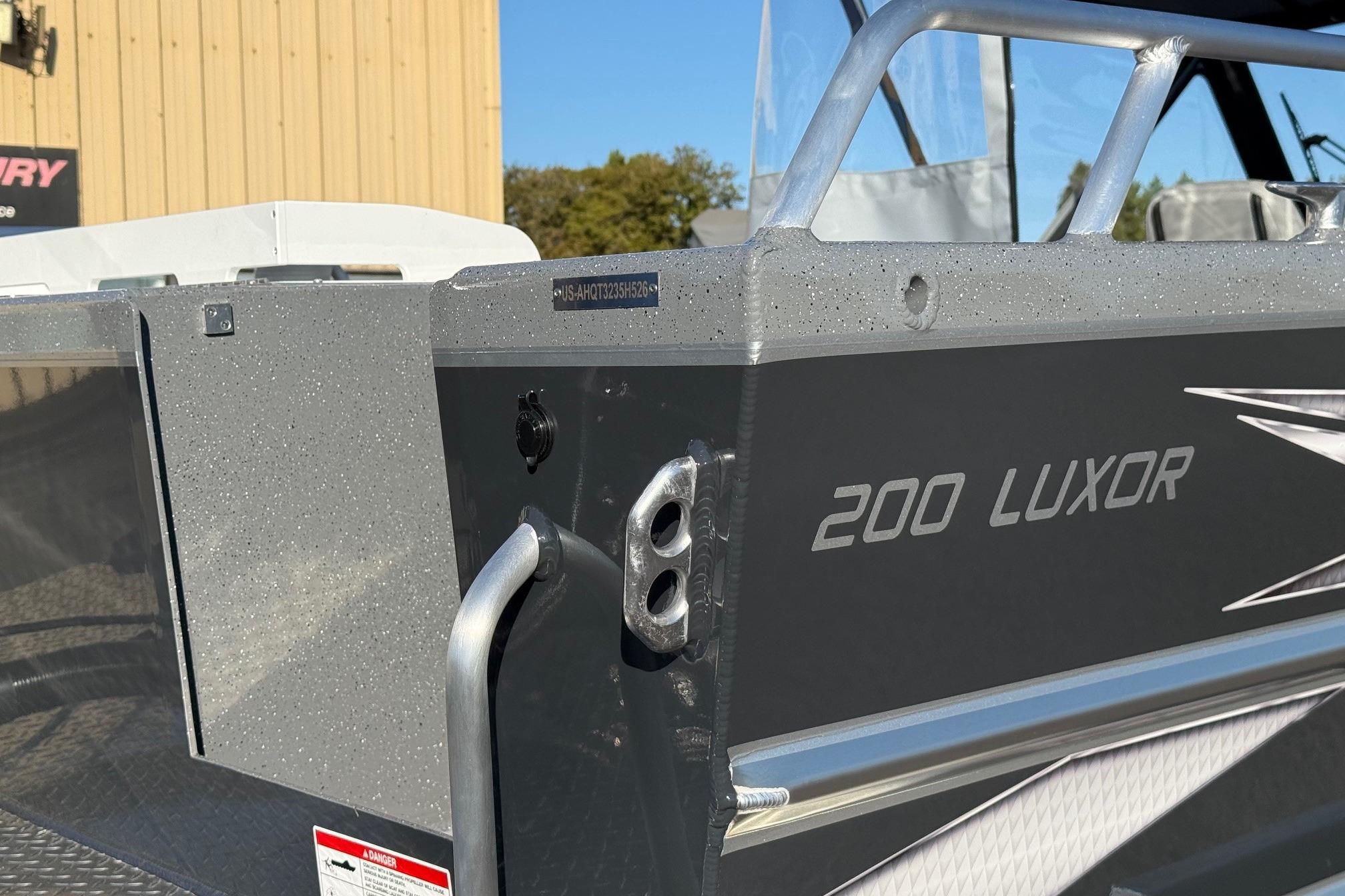 2026 Thunder Jet 200 Luxor boat exterior detail with branding and sleek design.