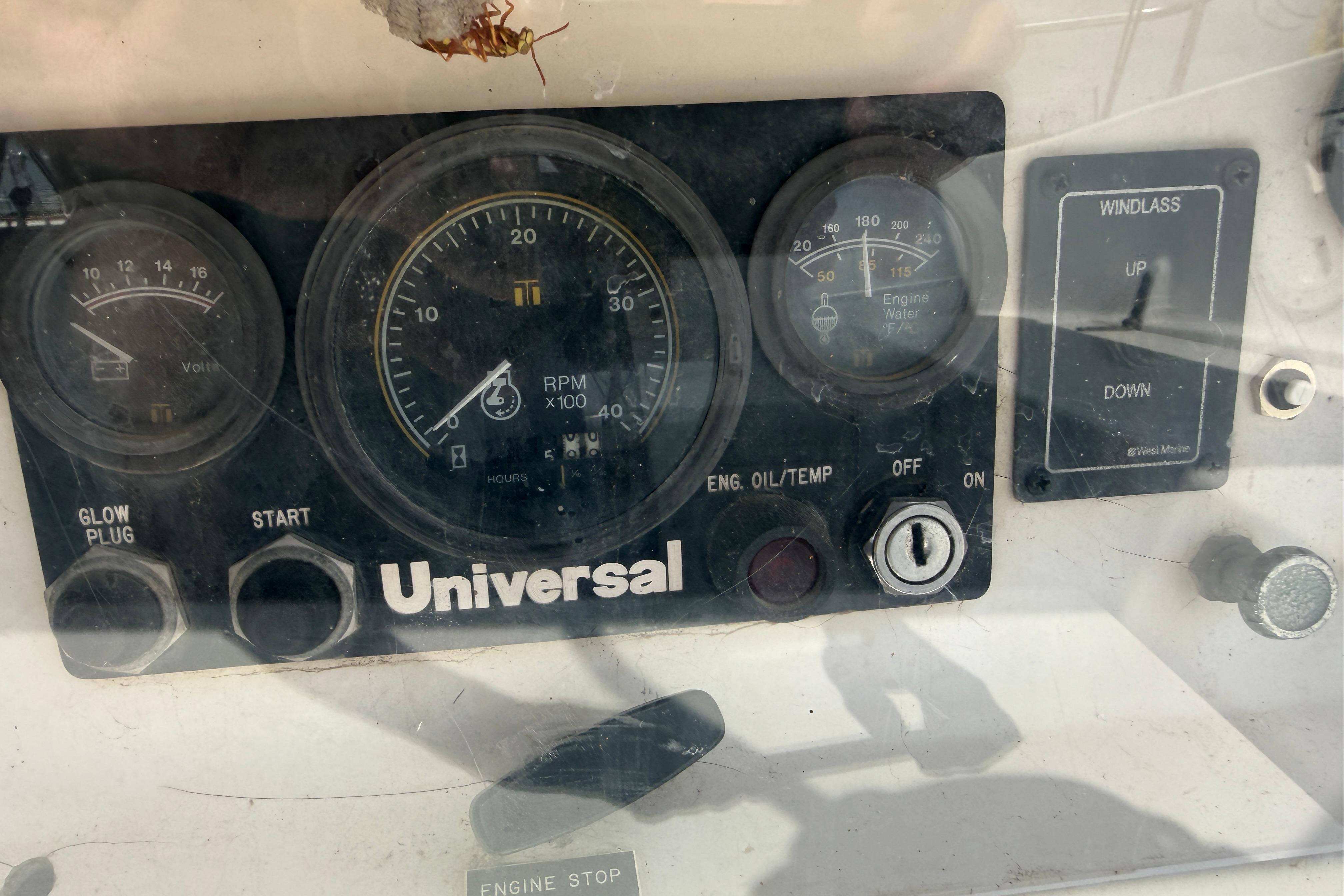 Control panel of a 1989 Nonsuch 36 sailboat with Universal engine gauges.