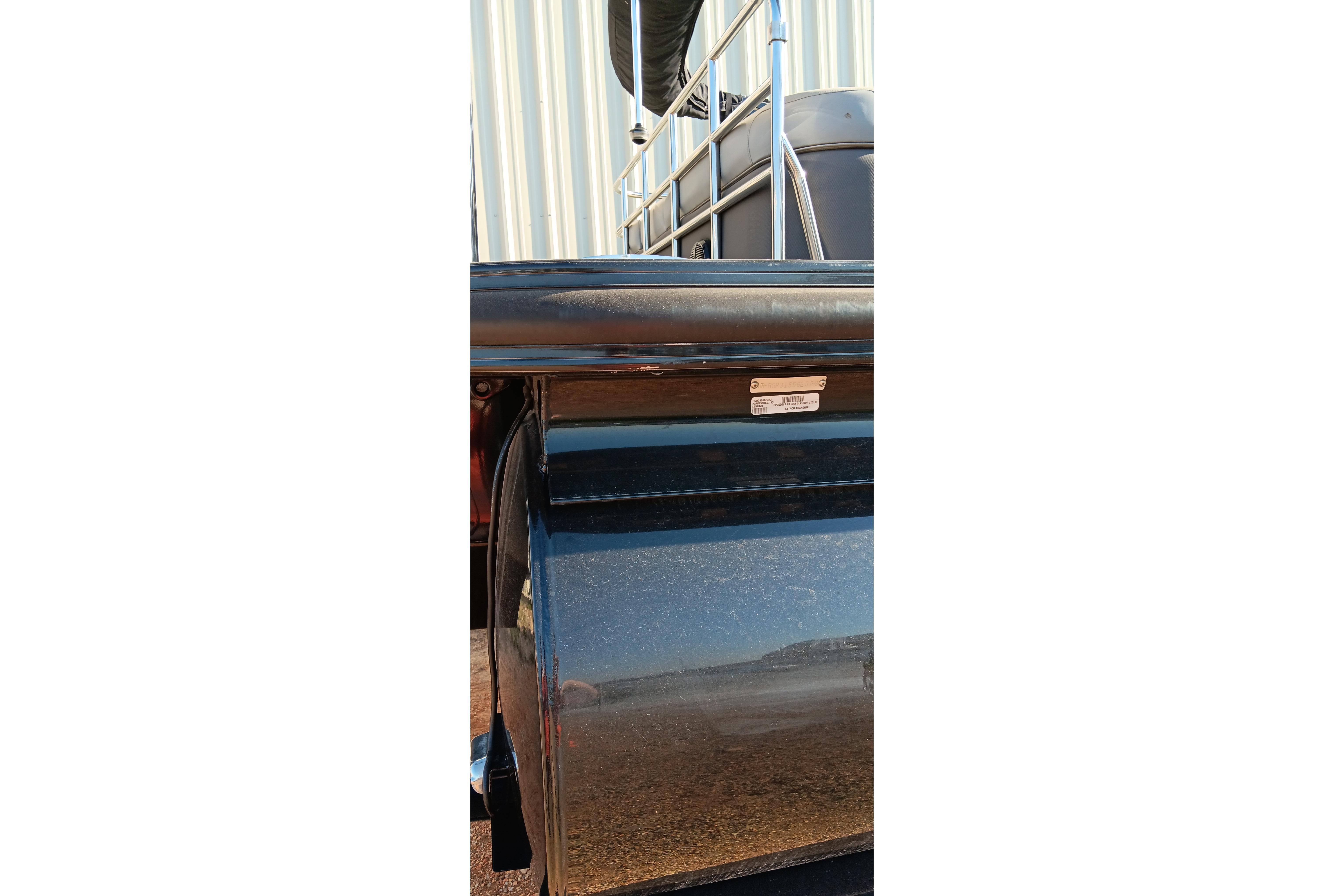 2023 Ranger 2500LS boat detail with metal railing and reflective surface.