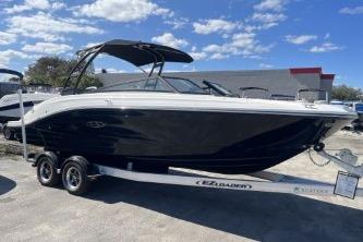 2024 Sea Ray SPX 230 boat on trailer under blue sky.