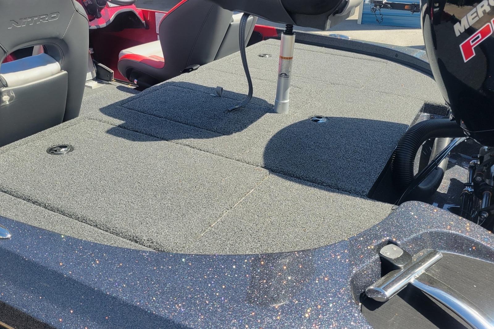2026 Nitro Z18 boat interior with carpeted deck and seating.