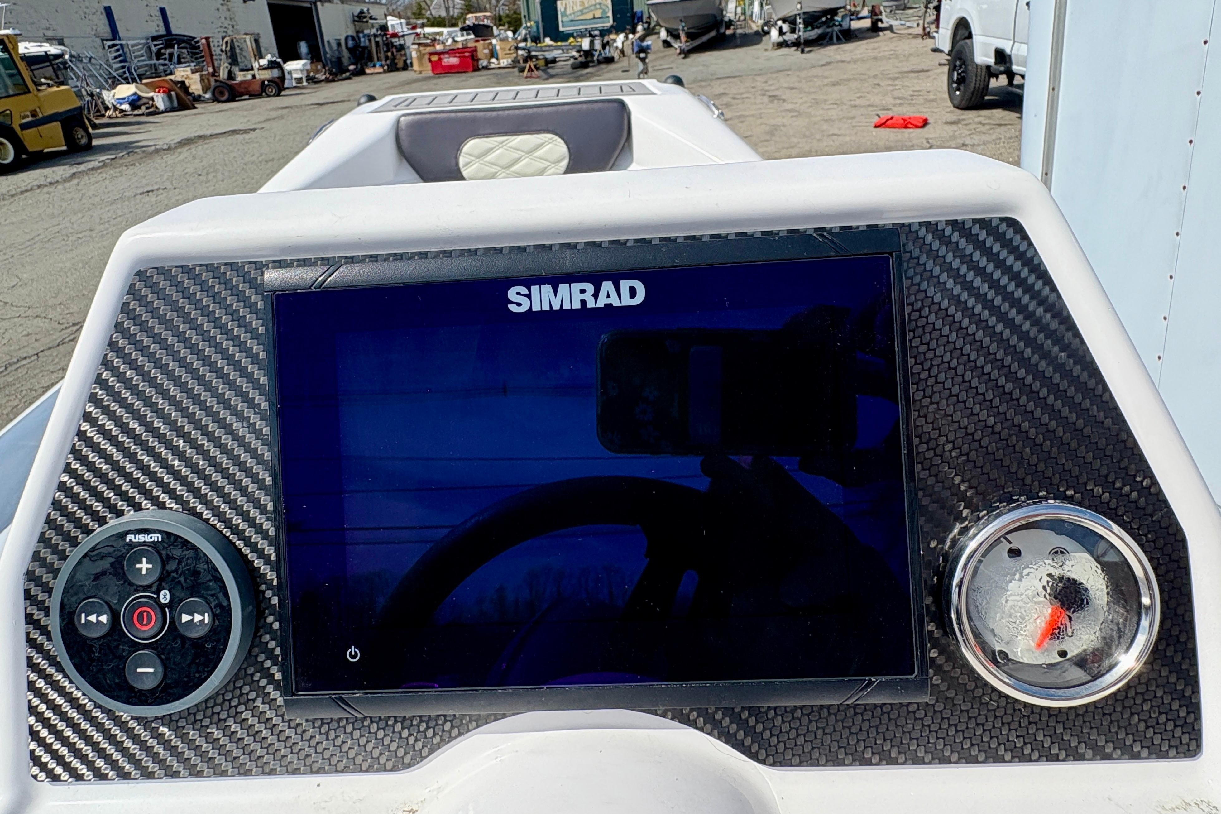 2024 Highfield Sport 360 dashboard with Simrad display and Fusion controls.