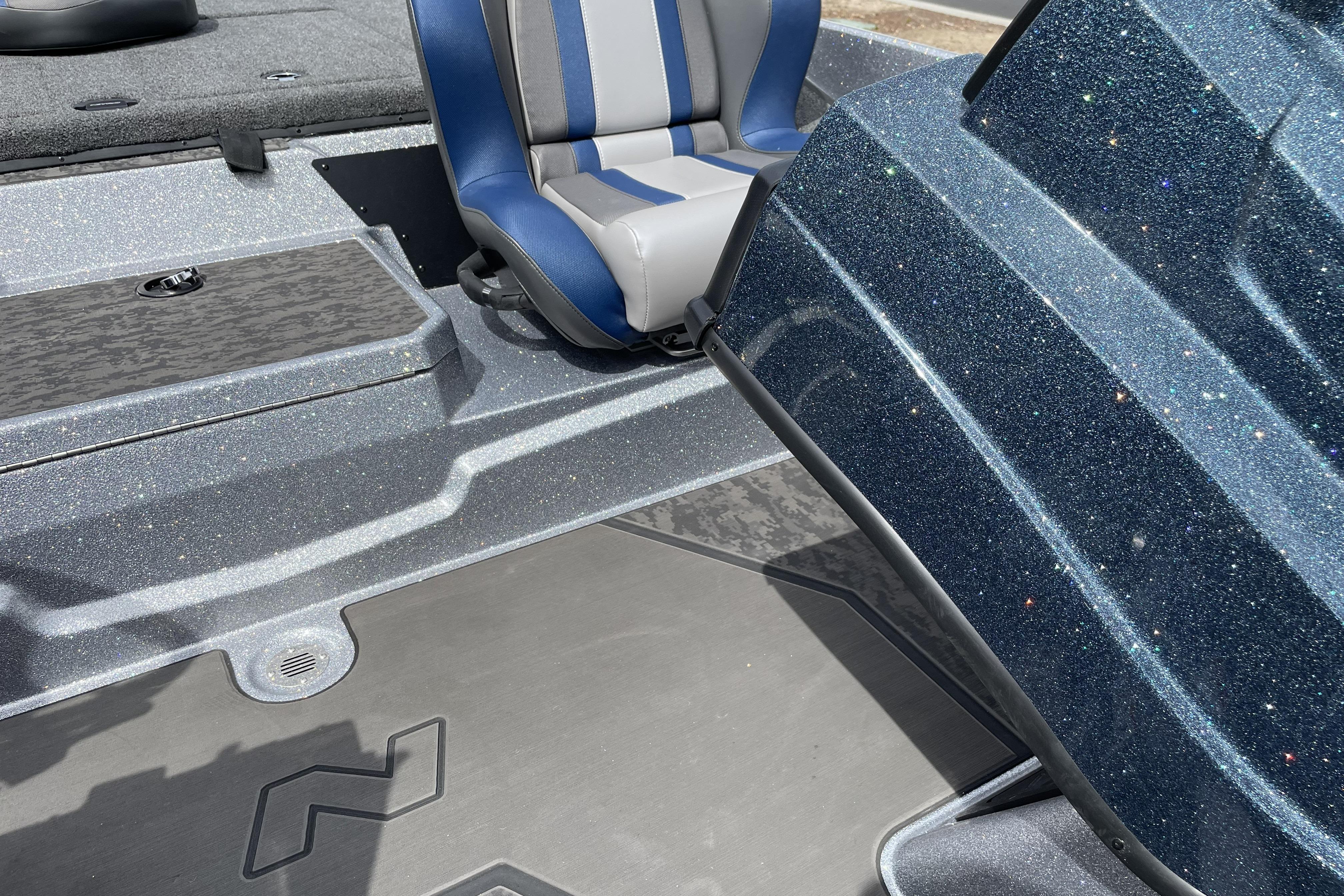 Interior of 2026 Nitro Z21 XL boat with blue and gray seating.
