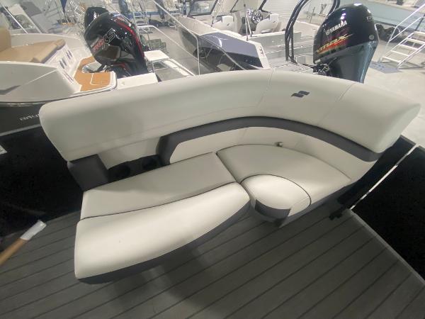 2024 Starcraft EXS 1 boat with white and gray seating.