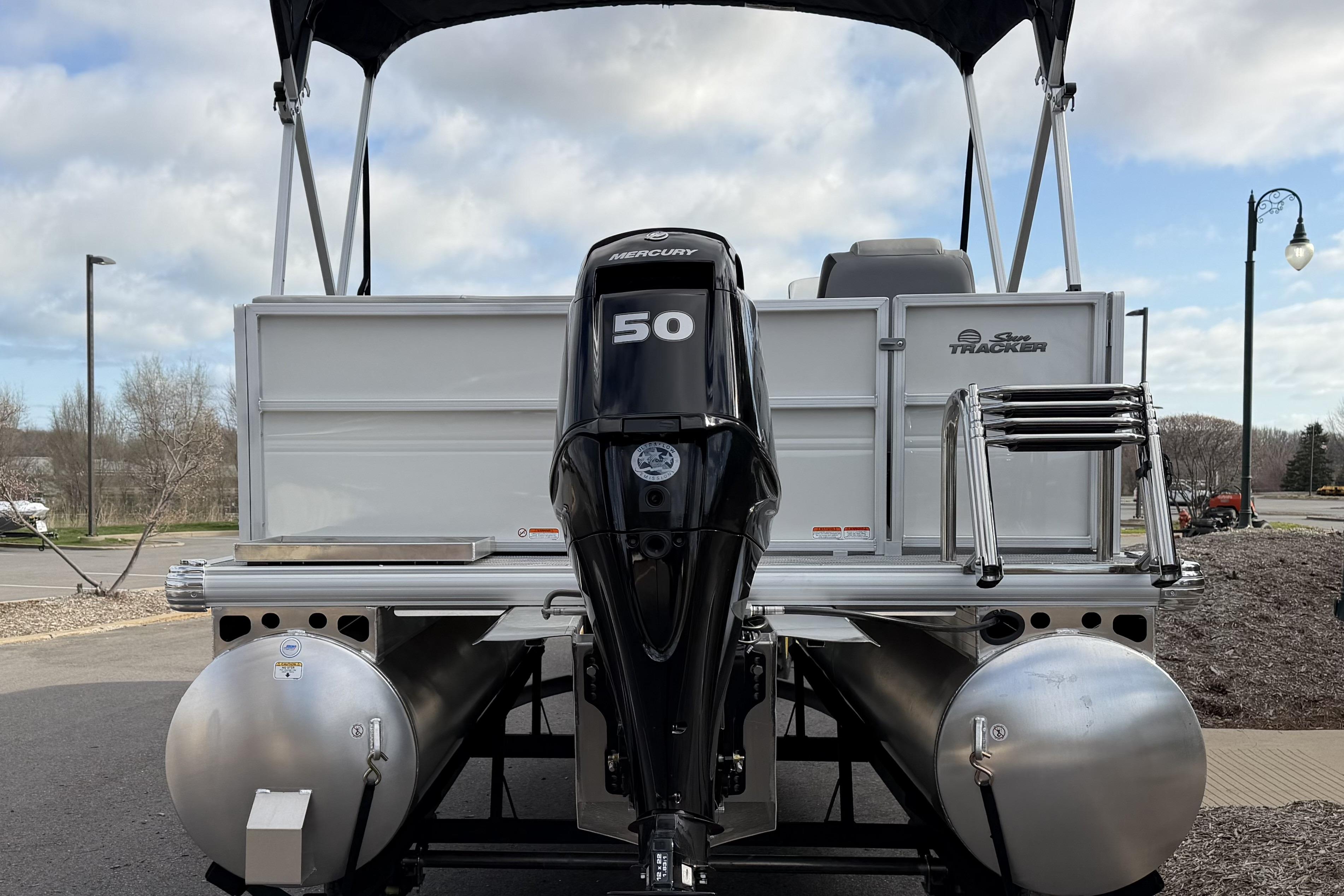 2026 Sun Tracker Party Barge 16 DLX with Mercury 50 engine, rear view.