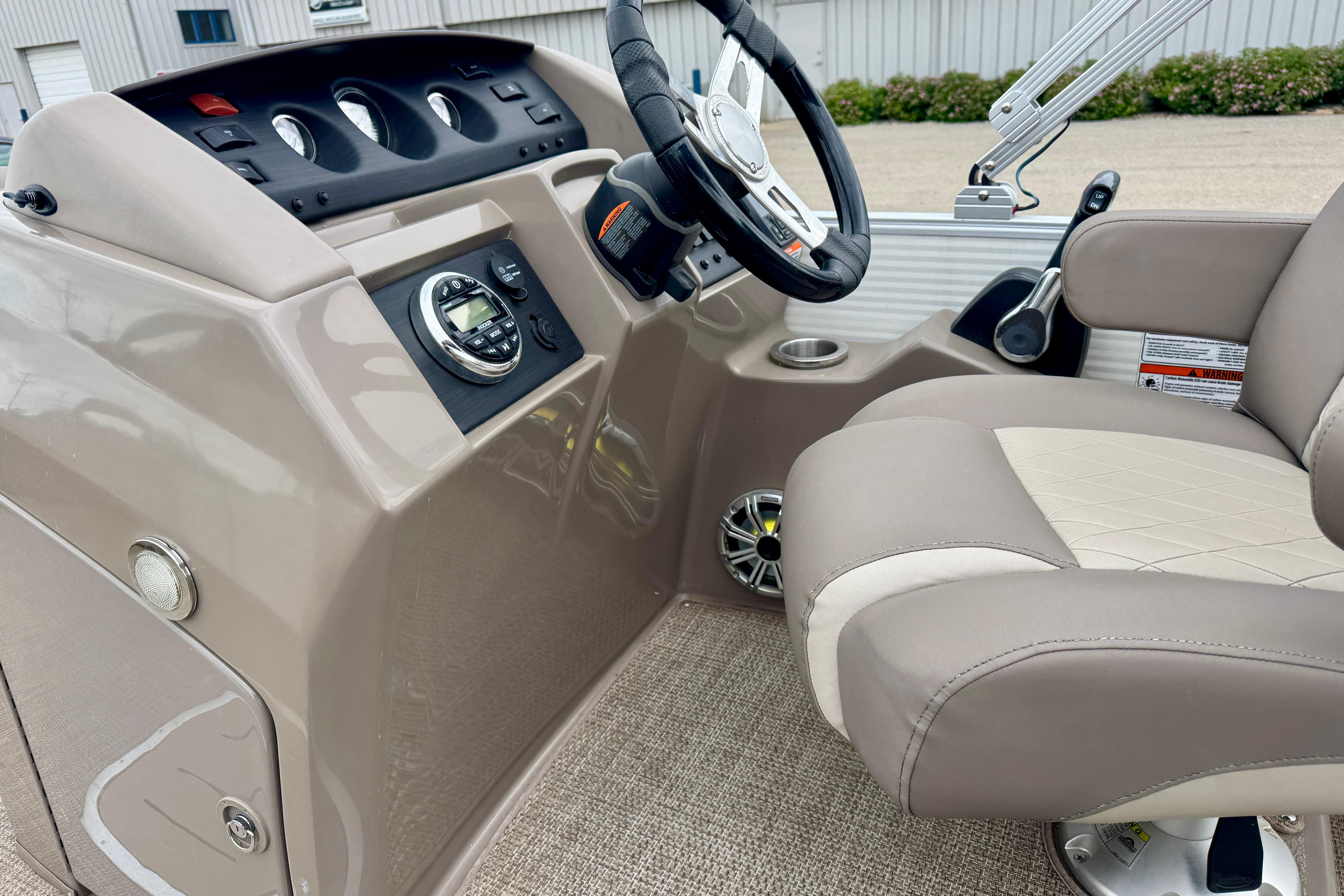 2019 Bennington SX 22 SSBXP boat interior with steering wheel and control panel.