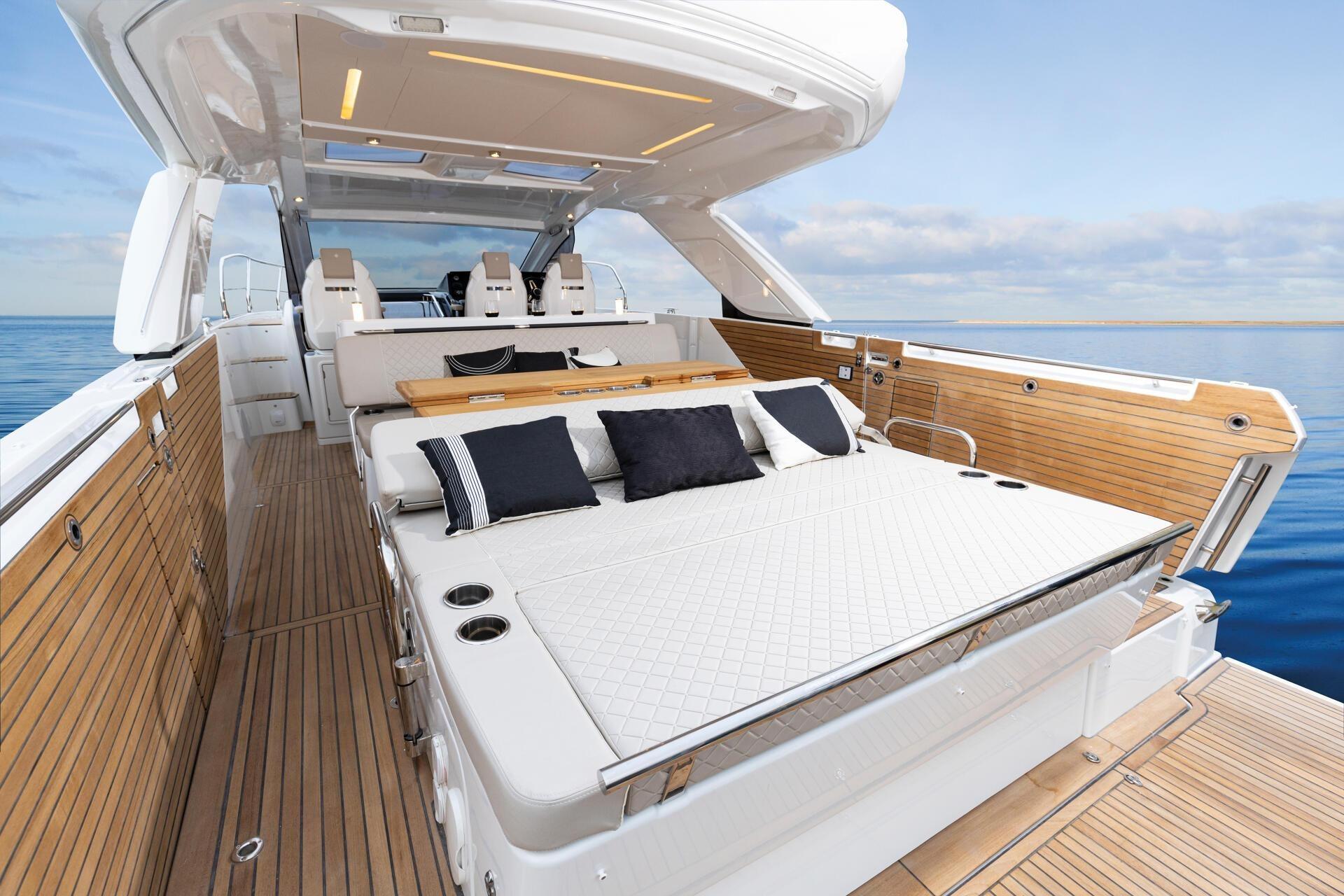 Luxurious 2027 Jeanneau DB/43 OB yacht interior with elegant seating and ocean view.