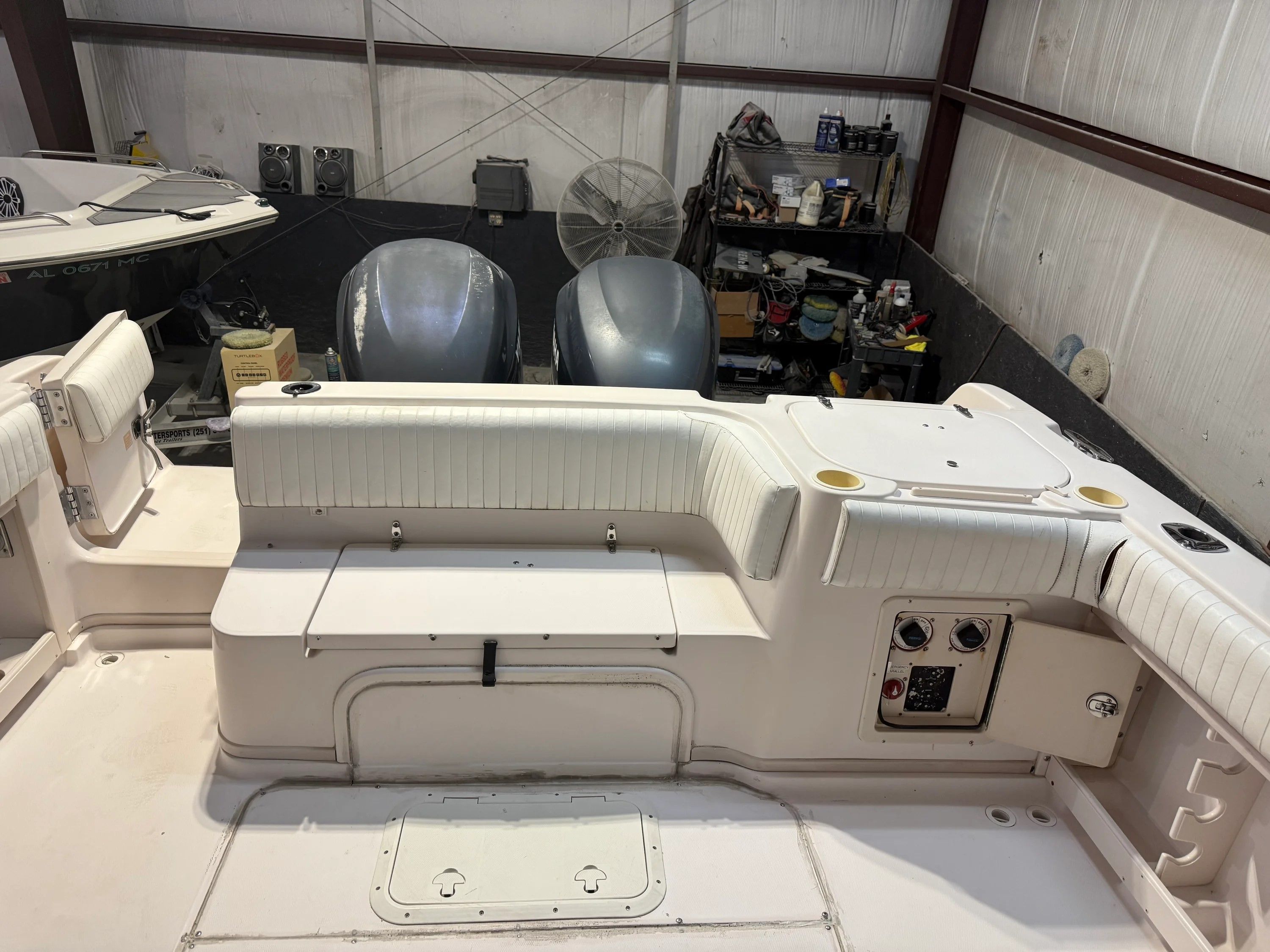 Interior view of a 2002 Grady-White Marlin 300 boat in a workshop.