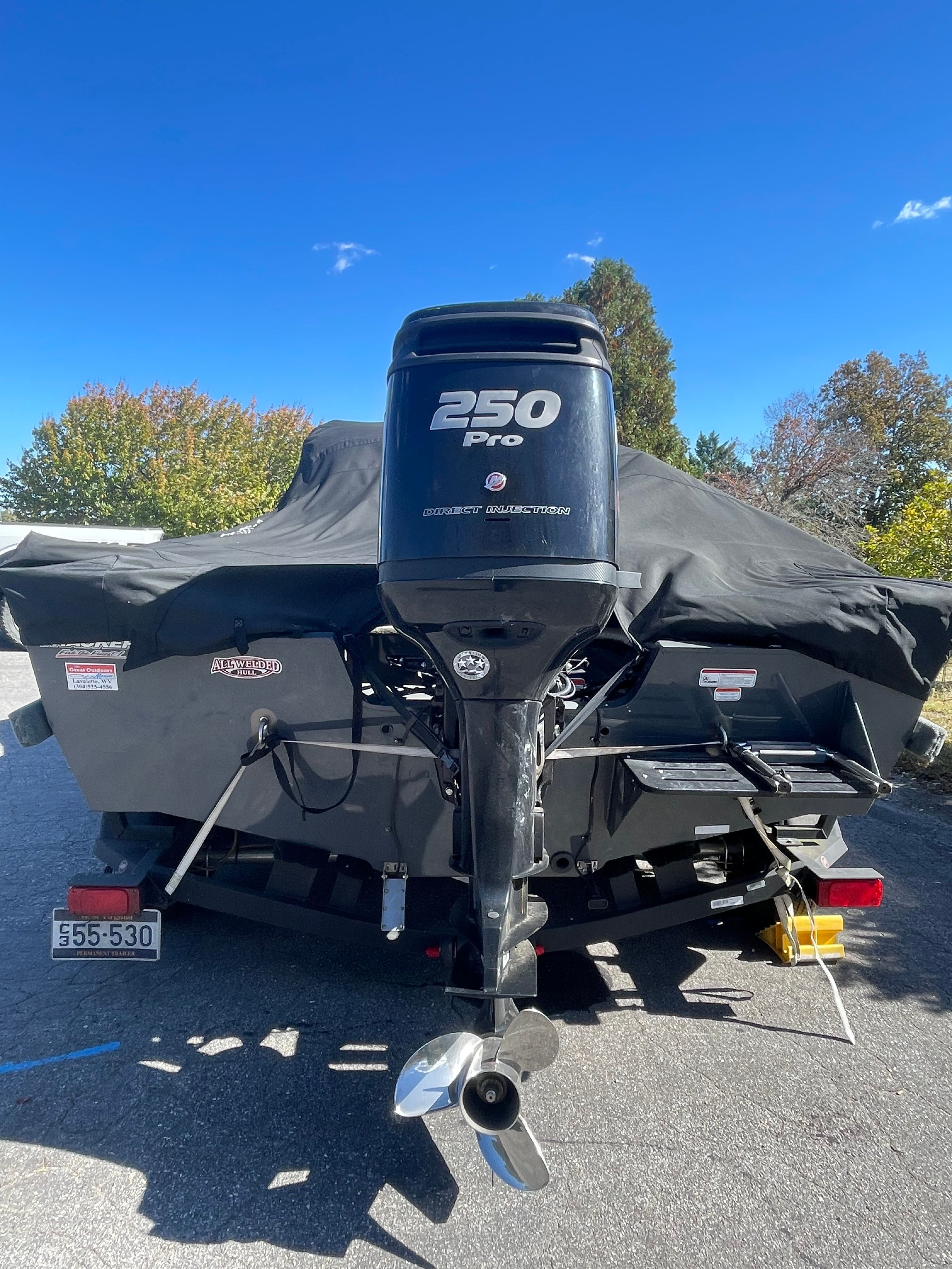 2017 Bass Tracker TARGA boat with 250 Pro motor, covered.