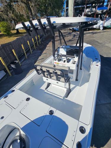 2026 Sea Hunt BX 22 BR boat with center console and rod holders, docked outdoors.