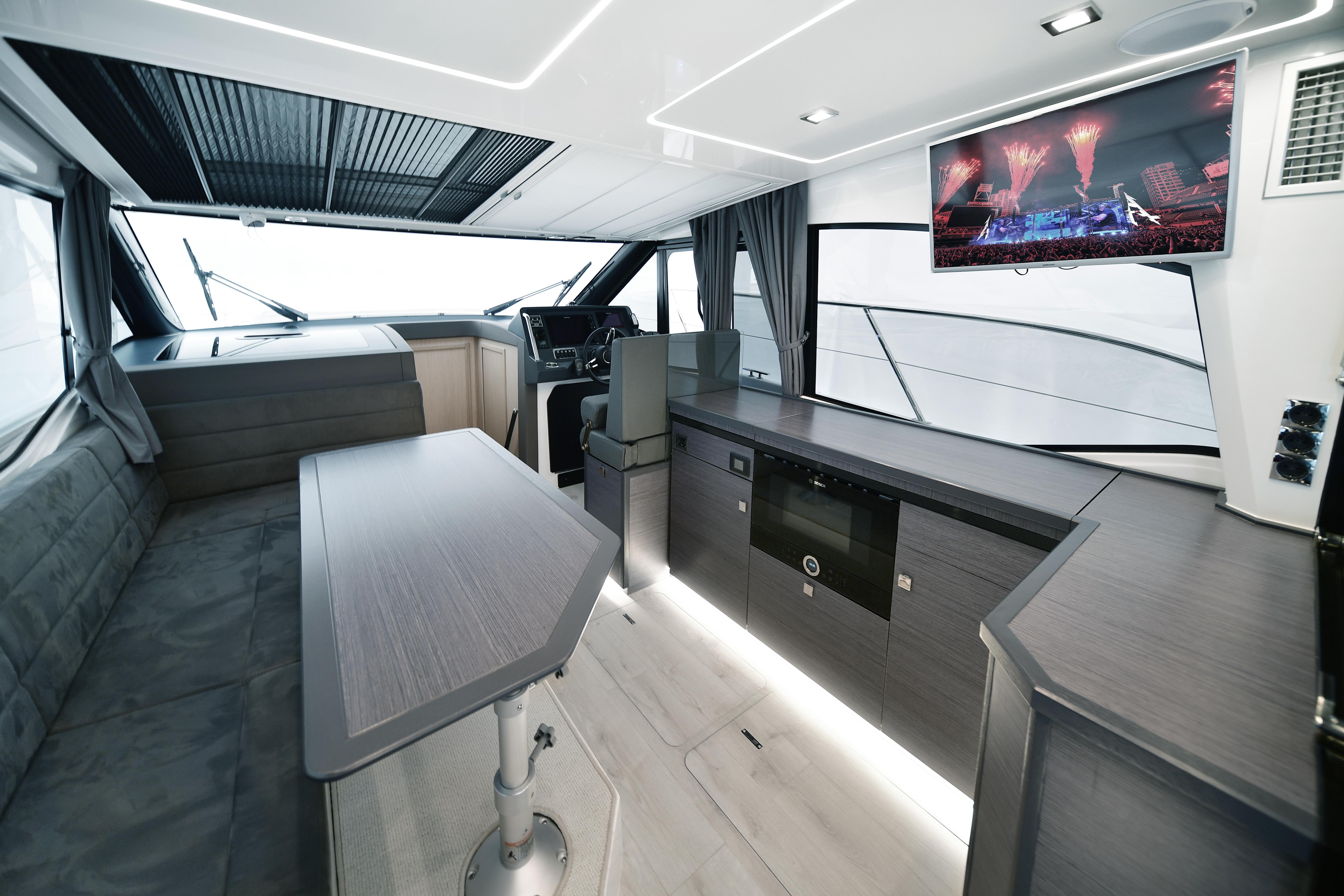 Luxurious interior of 2025 Skamander Monaco Coupe yacht with modern amenities and sleek design.
