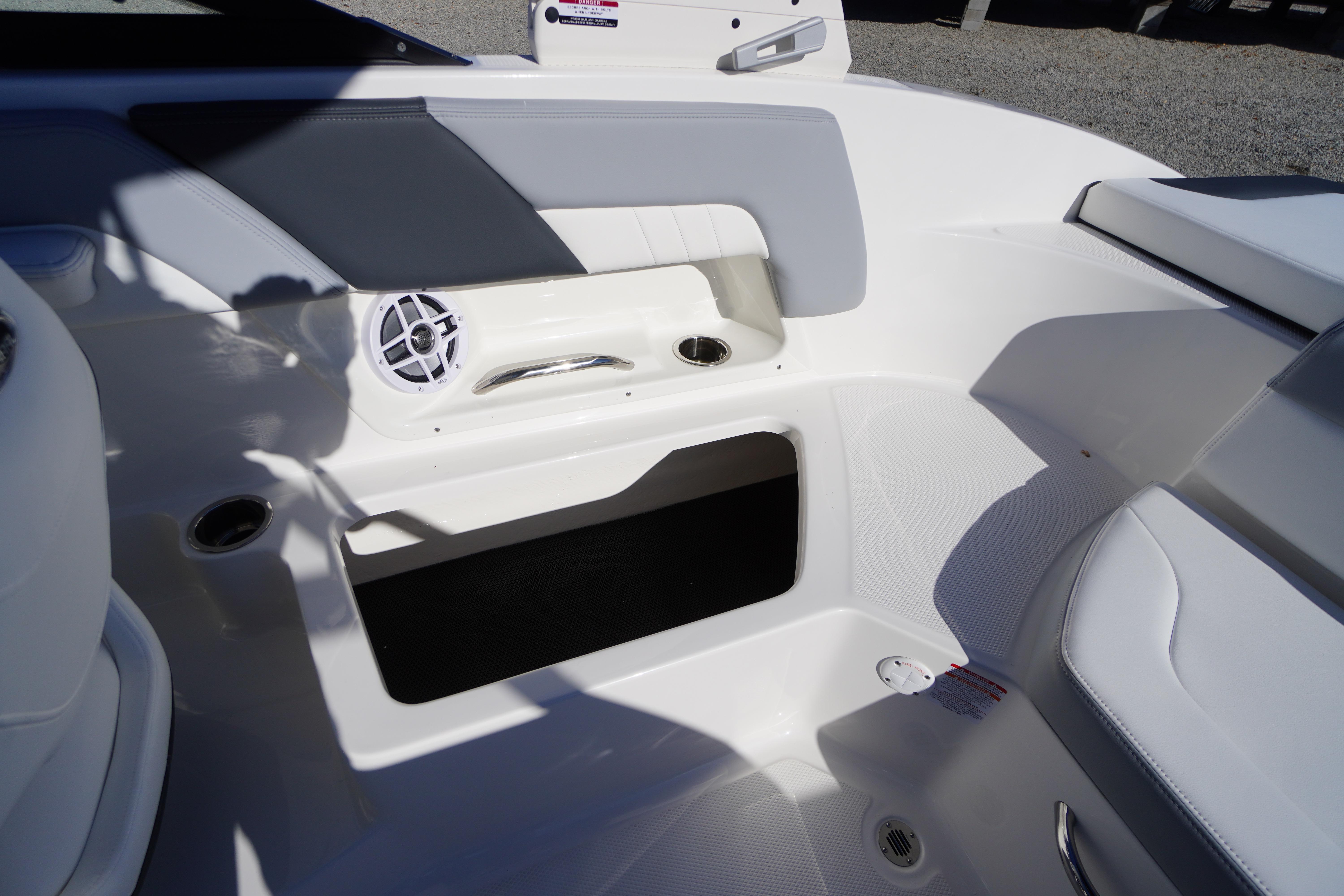 Interior of 2026 Chaparral 23 SSi boat, featuring seating and speaker system.