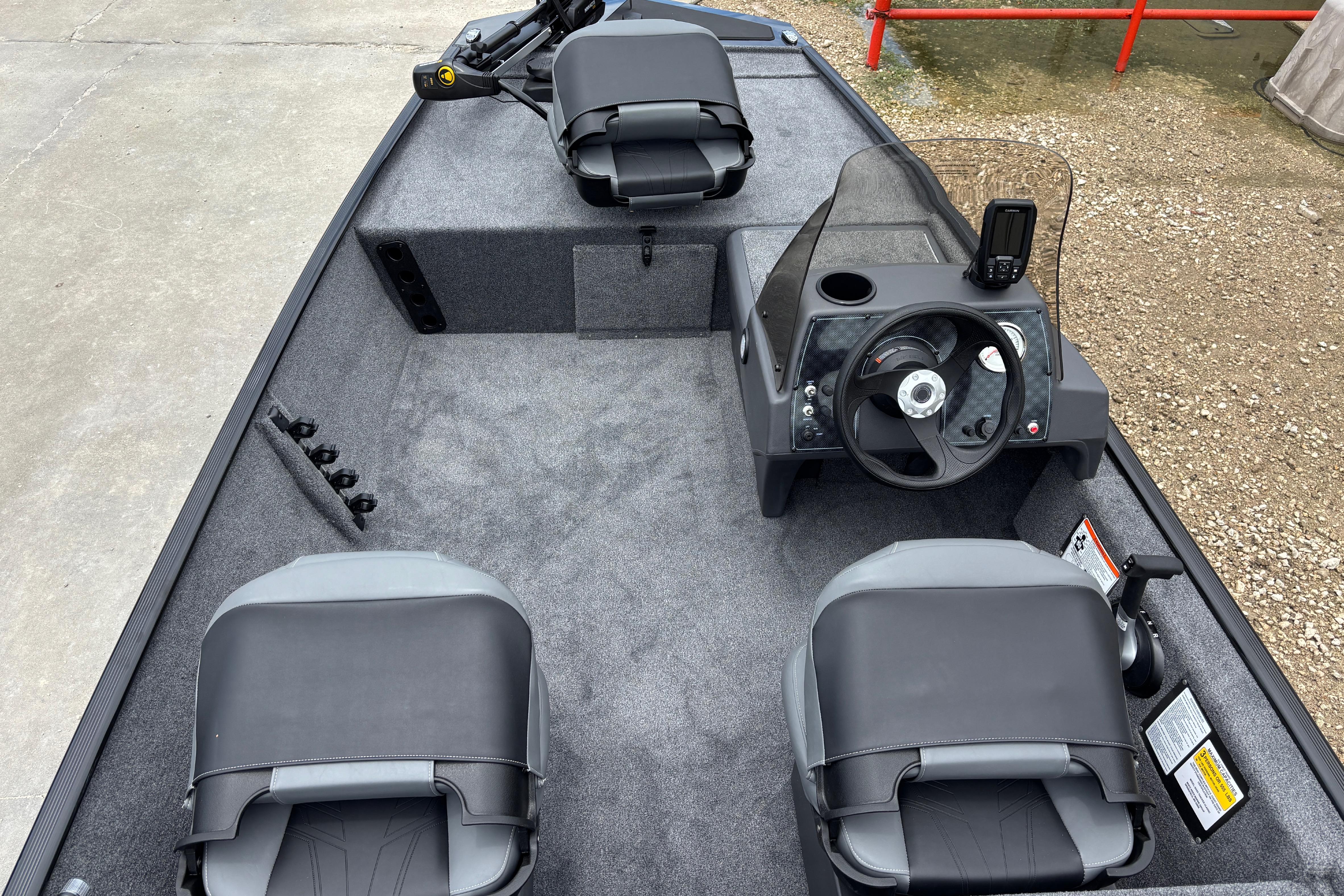 2026 Tracker Bass Tracker Classic XL boat interior with steering console and seating.