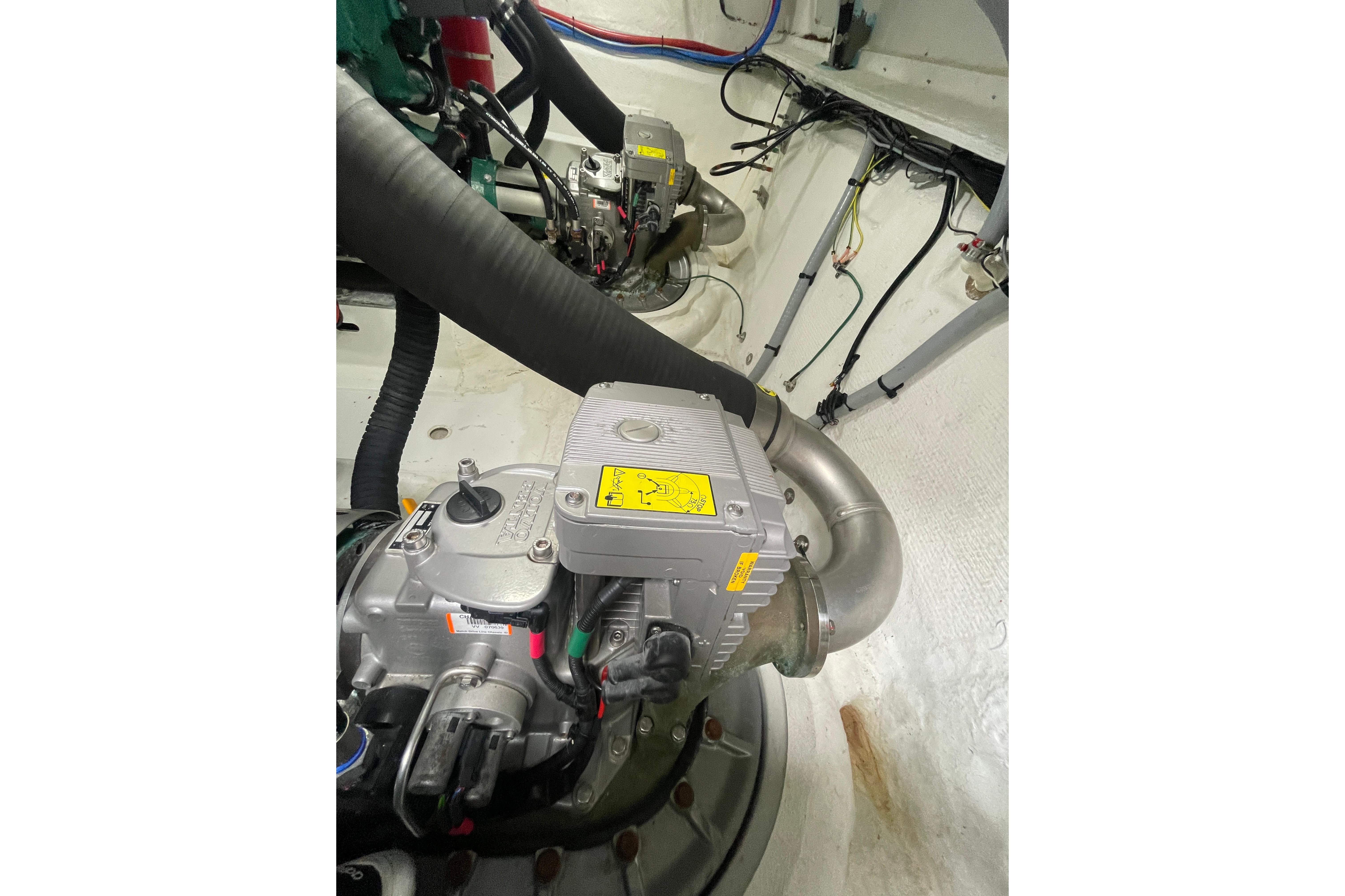 Engine compartment of a 2017 Jeanneau Leader 46 boat, showcasing mechanical components.