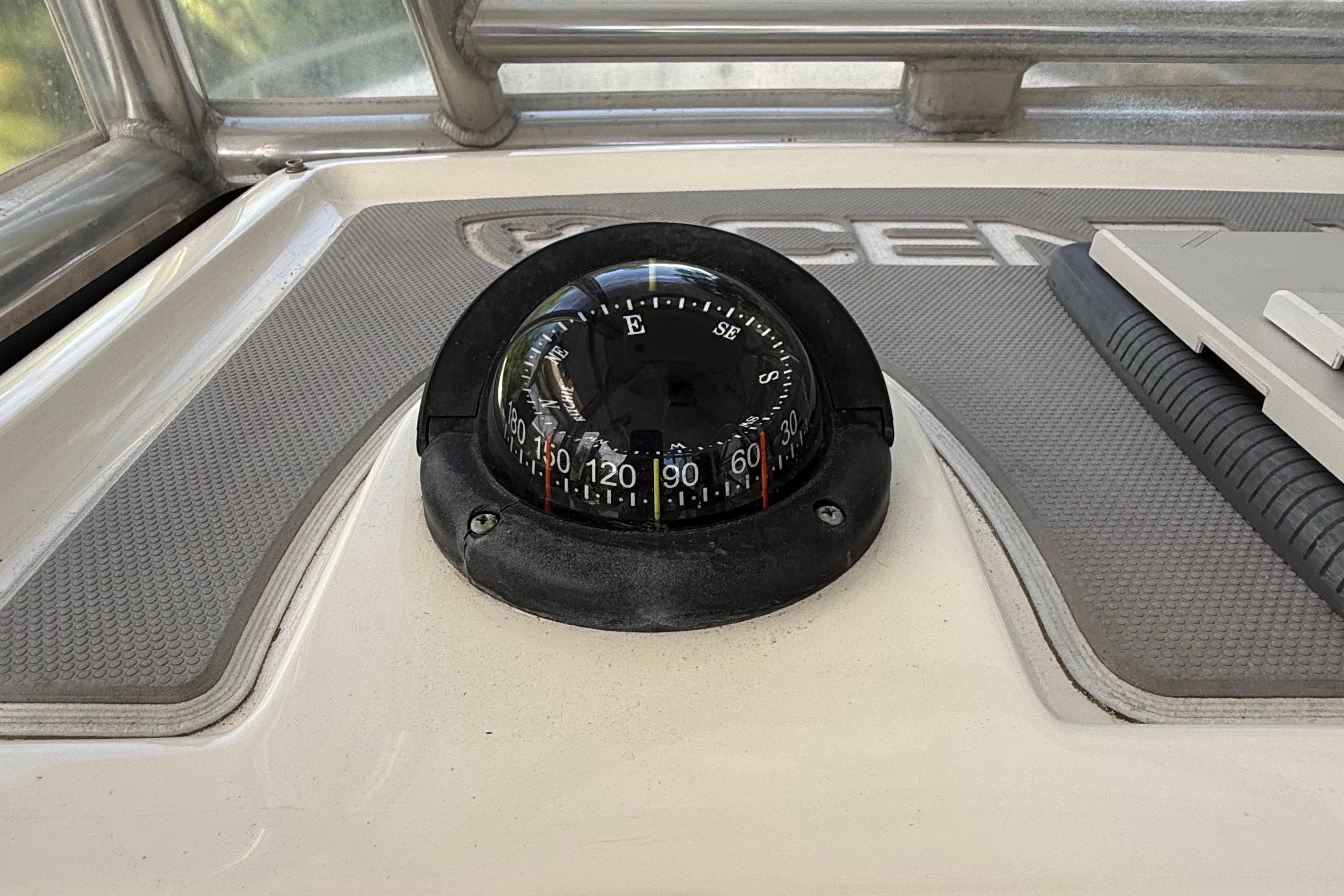 Compass on 2008 Century 2901 Center Console boat dashboard.