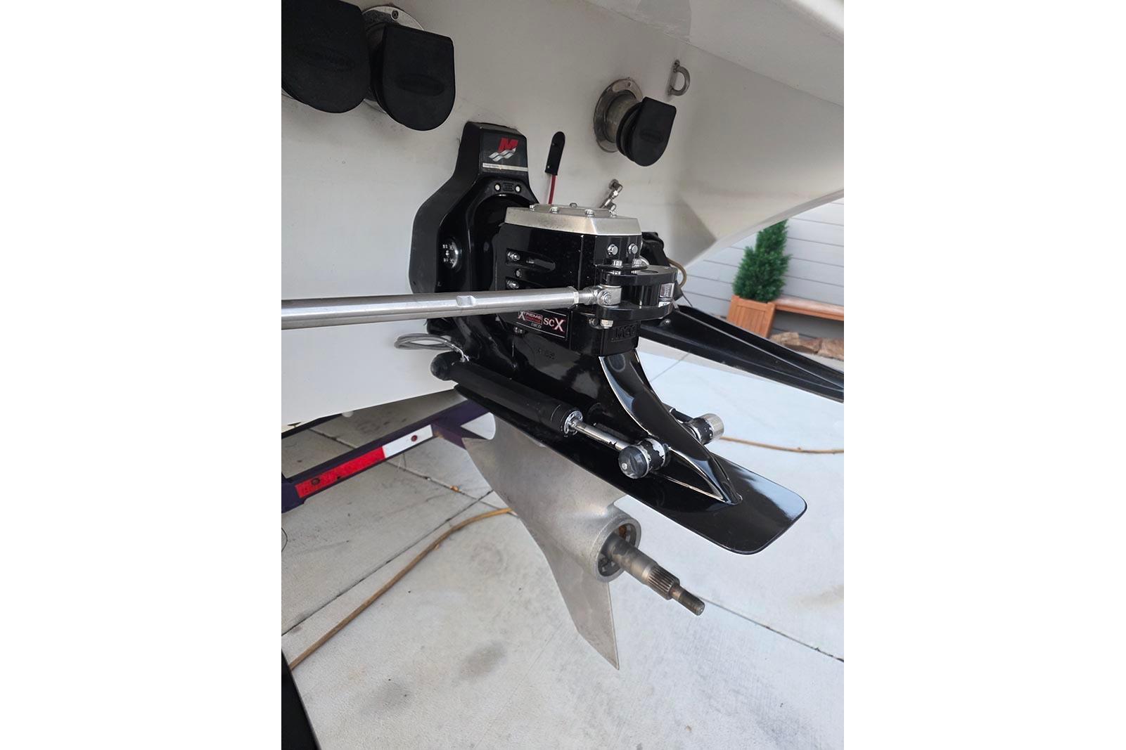 2004 Fountain 38 Lightning boat outdrive, showcasing sleek design and engineering.