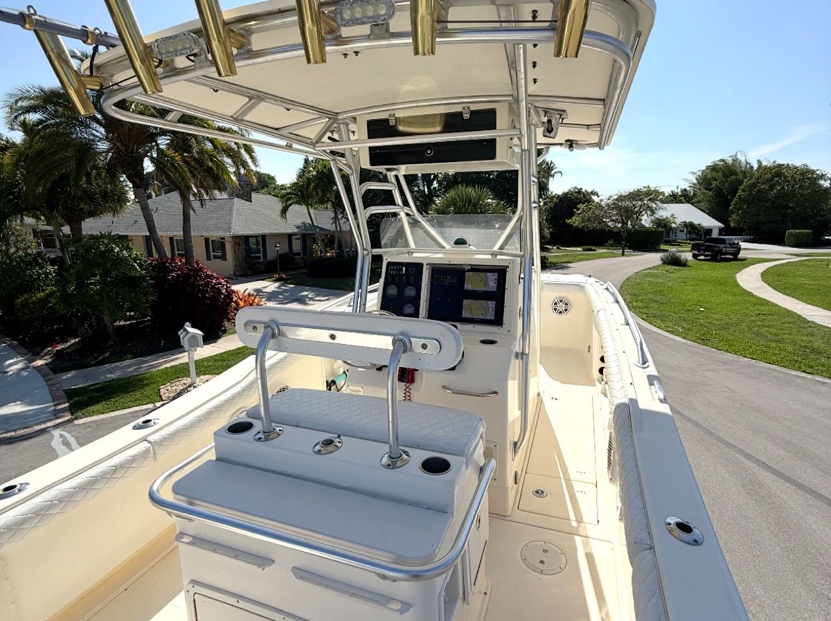 Interior view of a 2004 World Cat 270TE boat with helm console.