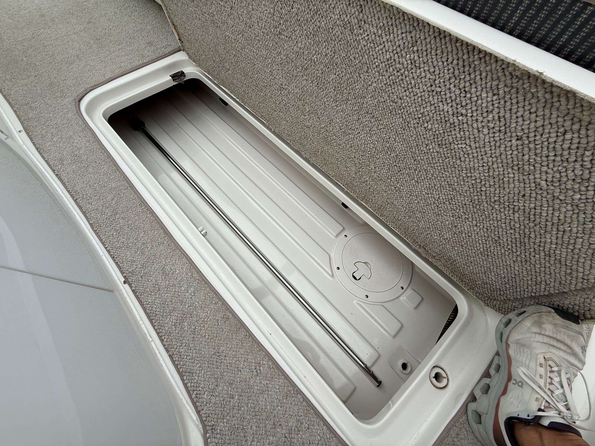 Storage compartment in 1998 Formula Thunderbird boat.