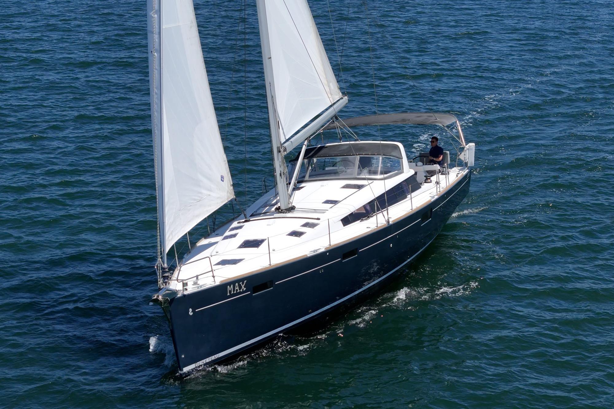 2017 Beneteau Sense 50 sailing on open water, showcasing sleek design and spacious deck.