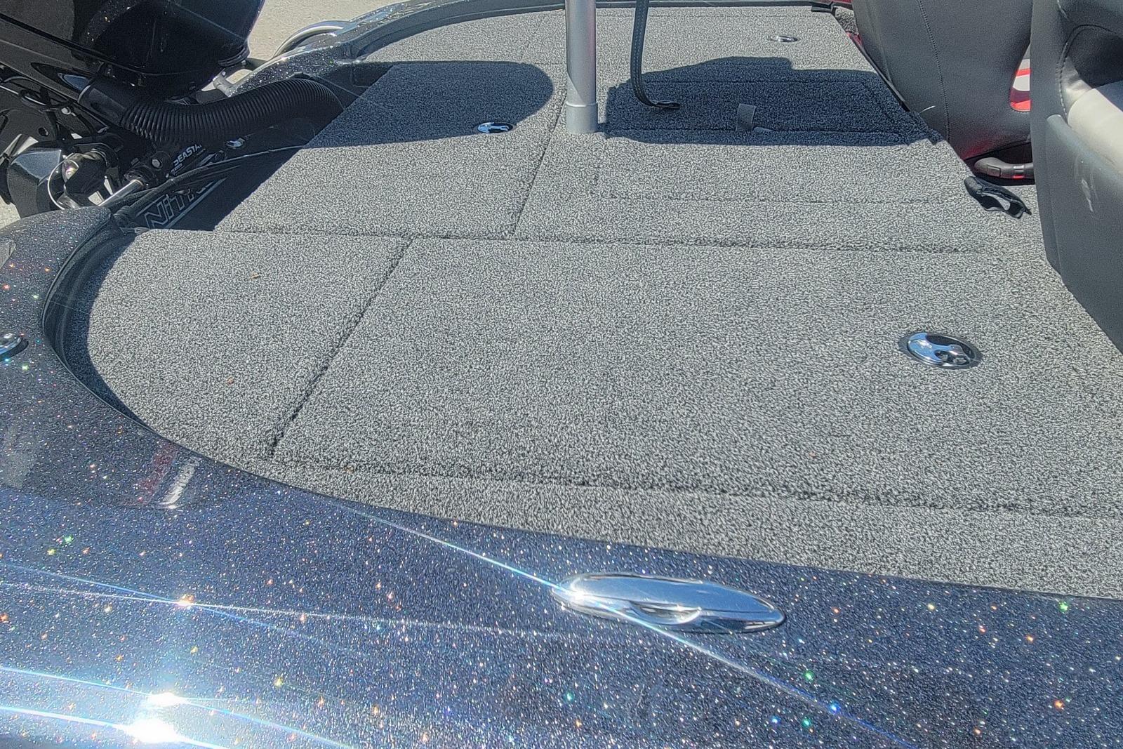2026 Nitro Z18 boat deck with carpeted surface and metallic finish.