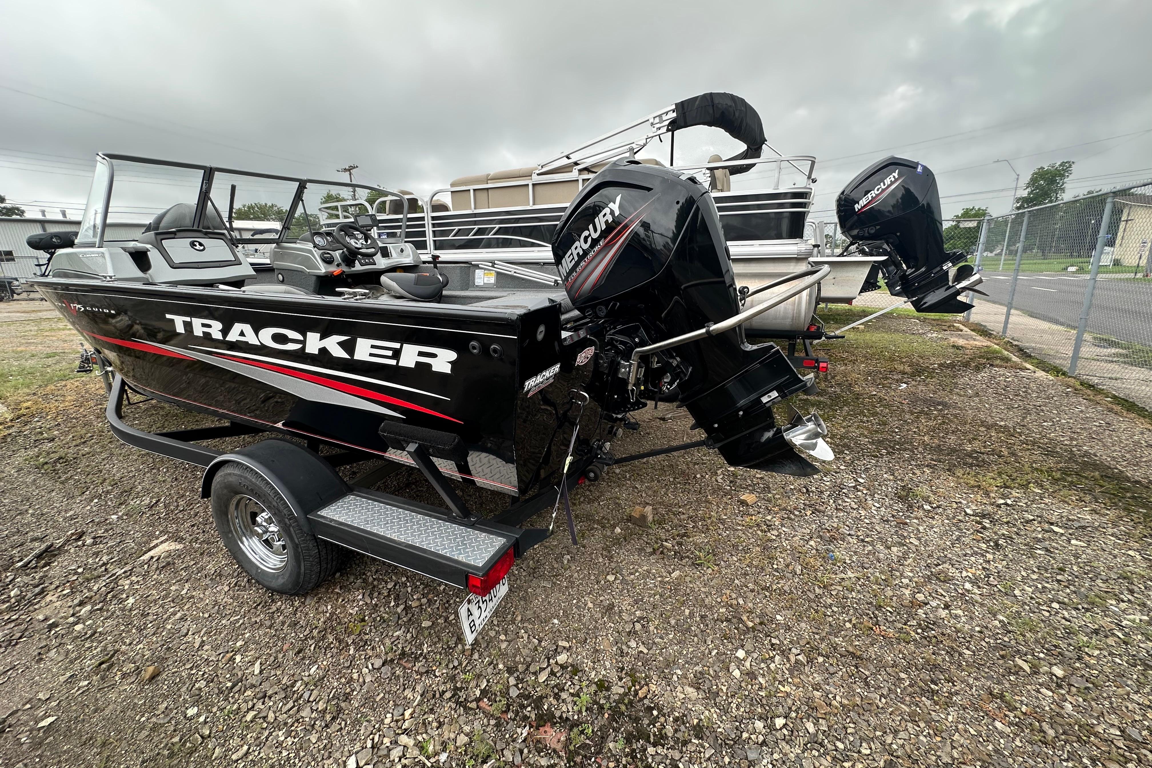2018 Tracker Pro Guide V-175 Combo boat with Mercury outboard motor on a trailer.