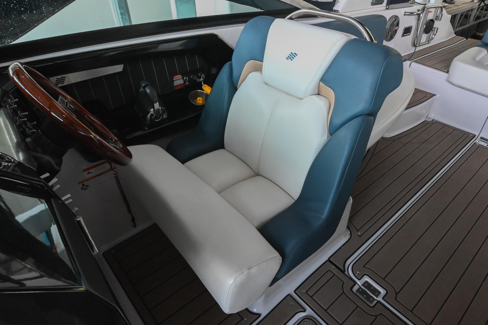 Luxurious seating in 2014 Four Winns H290 boat, featuring elegant design and premium materials.