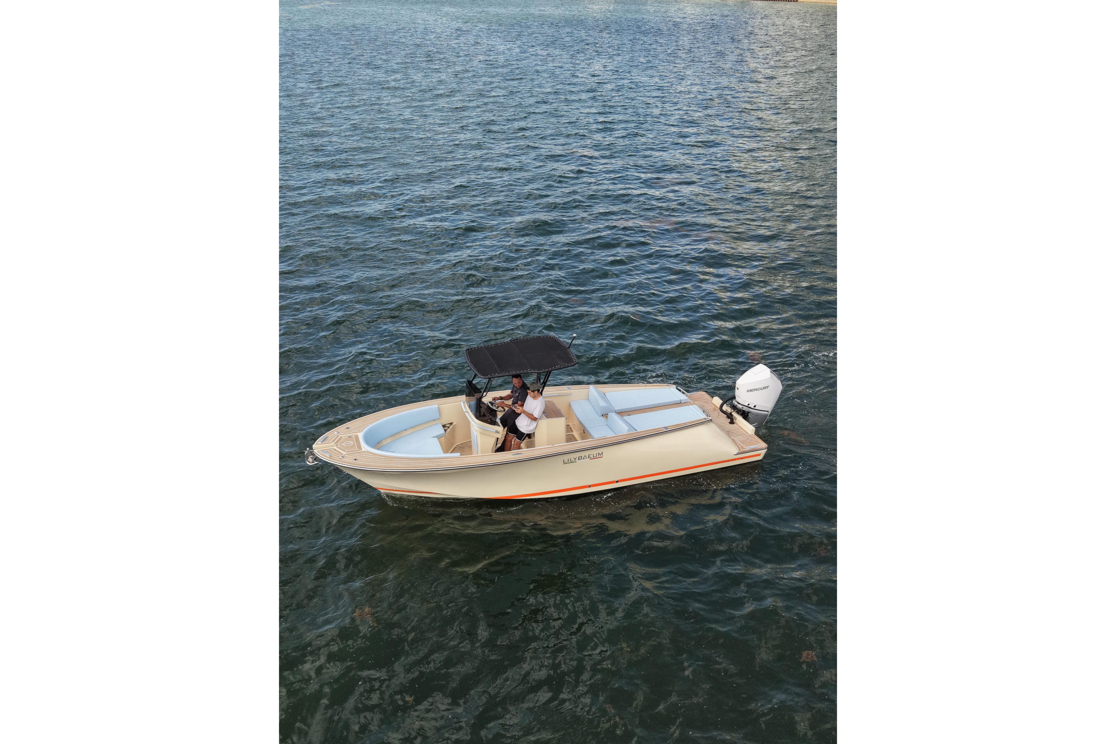 2026 Lilybaeum Levanzo 25 boat on water, featuring sleek design and modern outboard motor.